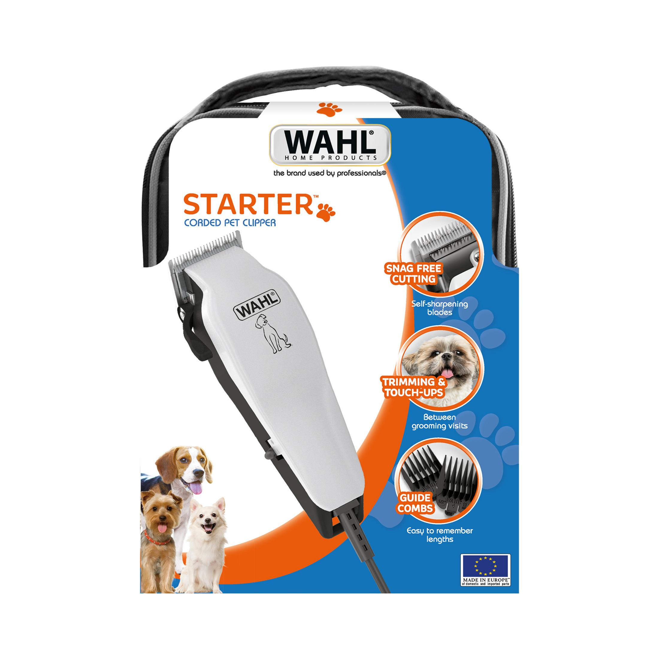 Kit iniziale Wahl Corded Pet Clipper con cani e accessori.