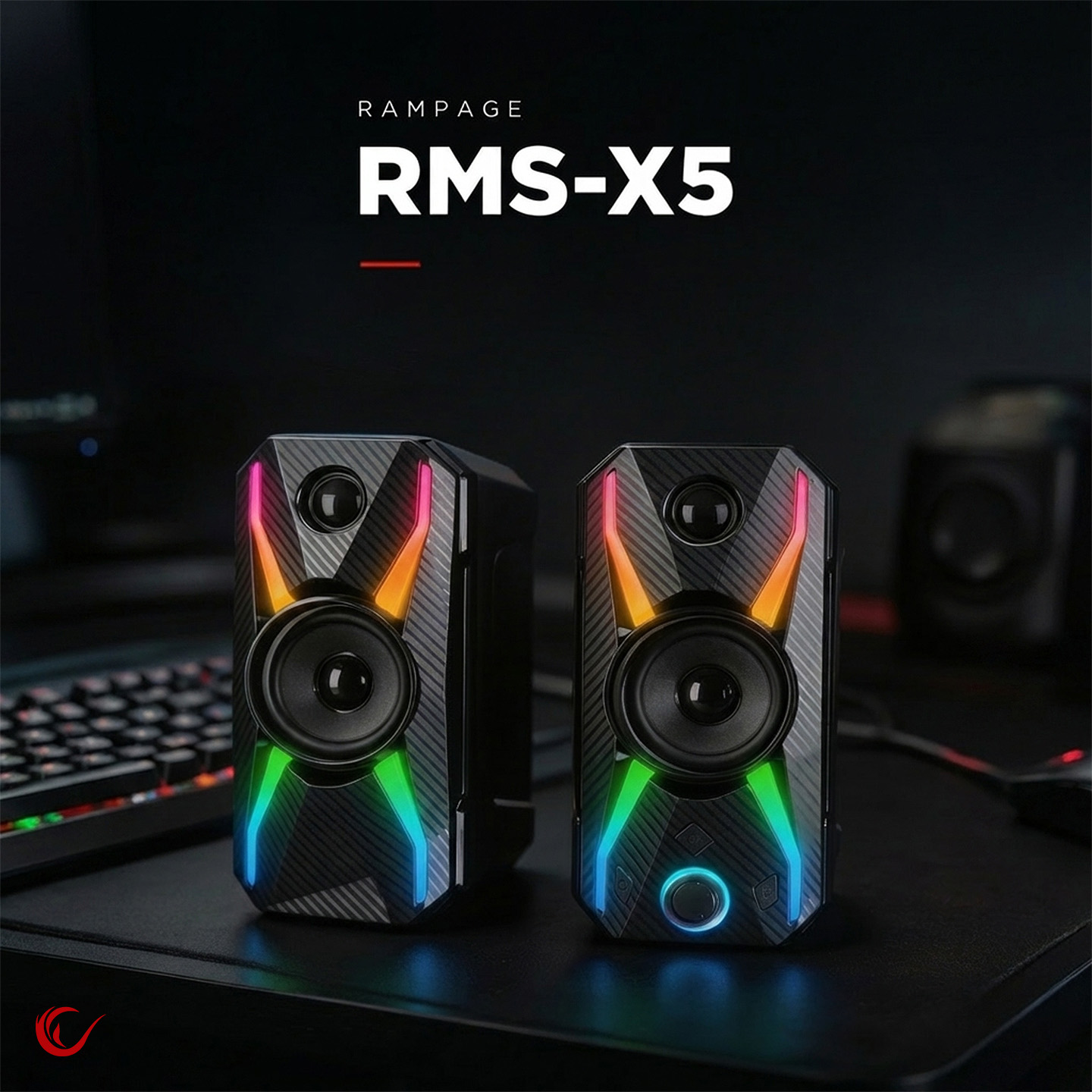 Renkli LED ışıklı iki siyah Rampage RMS-X5 hoparlör bir masanın üzerinde.