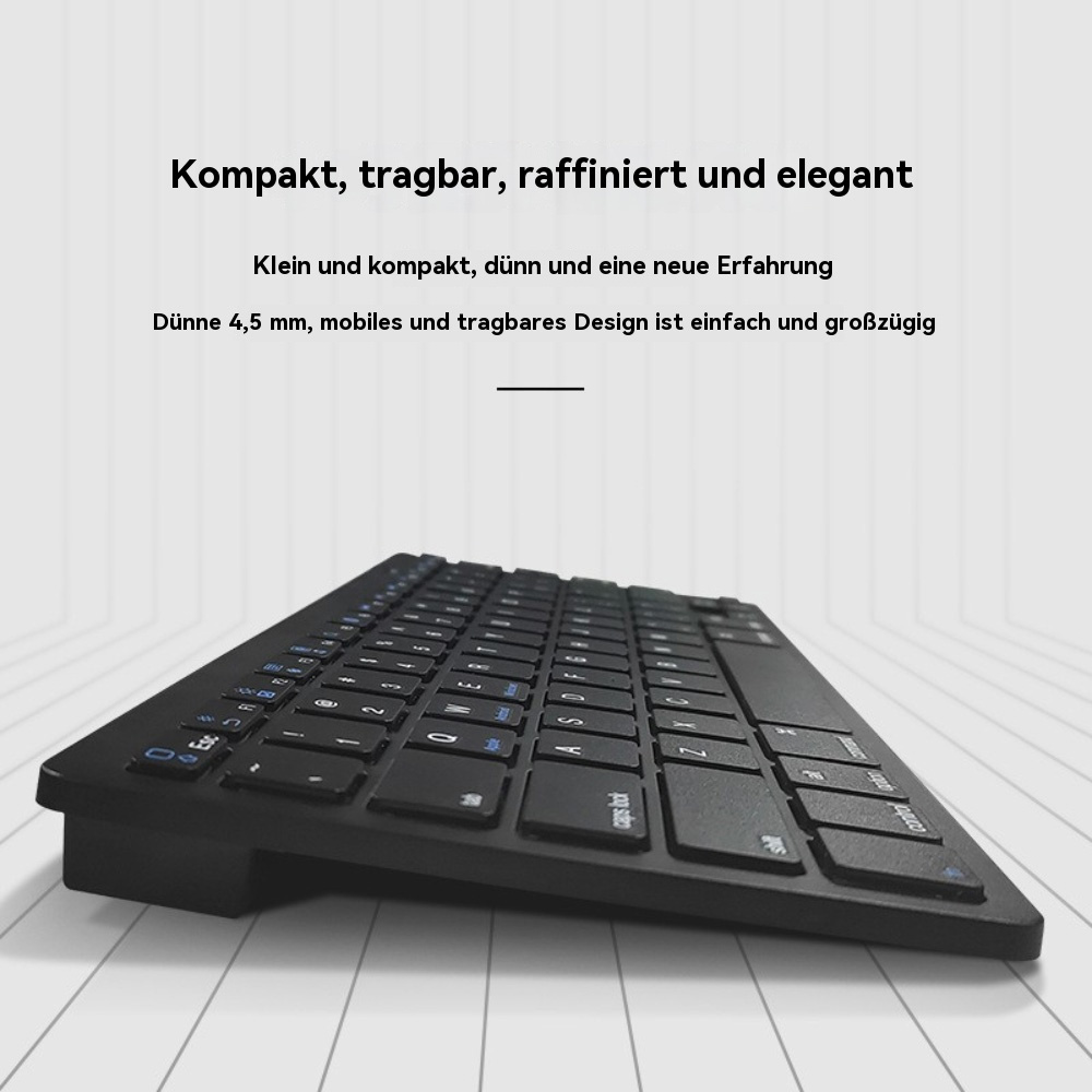 Schwarze, schlanke Tastatur auf weißem Hintergrund mit Linienmuster.
