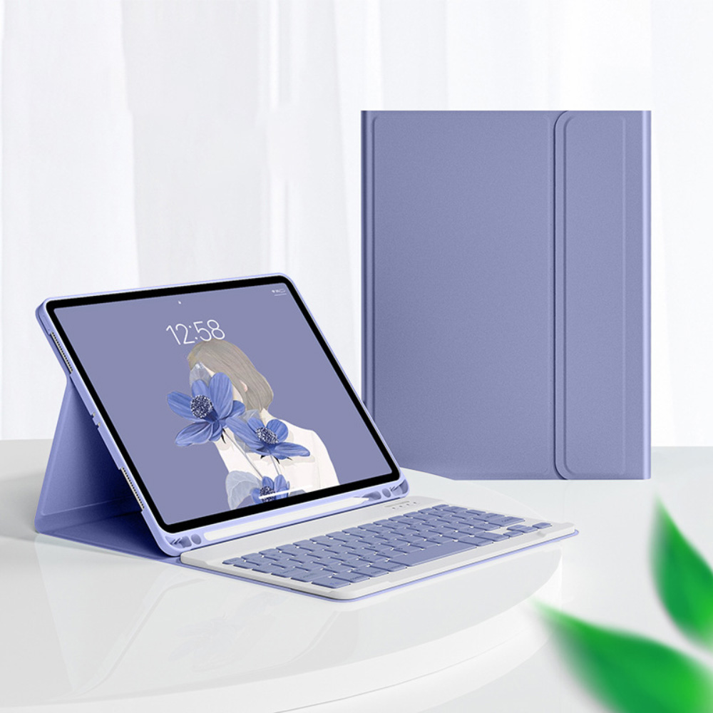 Ein lila Tablet mit Tastatur und einer Abbildung einer Frau mit Blumen auf dem Bildschirm.