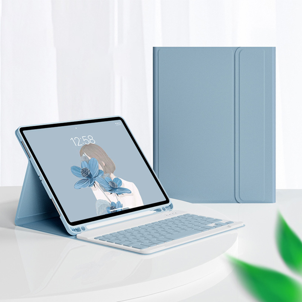 Ein hellblaues Tablet mit Tastatur und einem stilisierten Bild einer Frau mit Blumen.