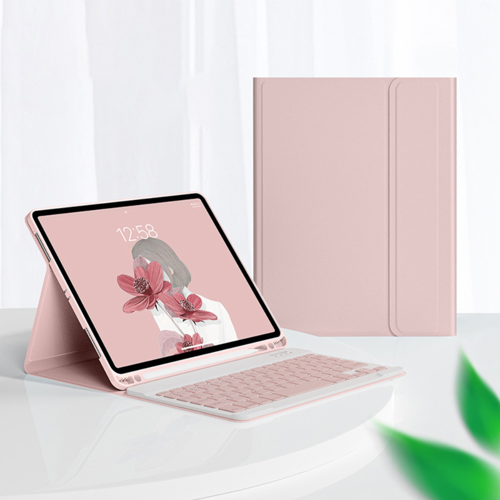 Ein rosa Tablet mit Tastaturhülle, das eine minimalistische Illustration zeigt. Eine weitere Hülle ist geschlossen.