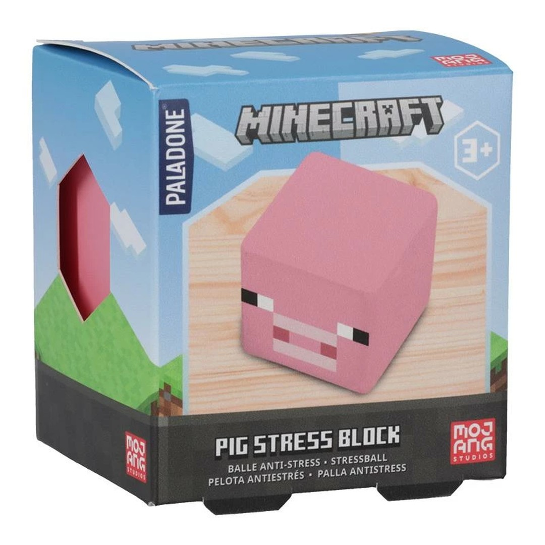 Opakowanie kostki antystresowej Minecraft z różowym prosiaczkiem na drewnie.