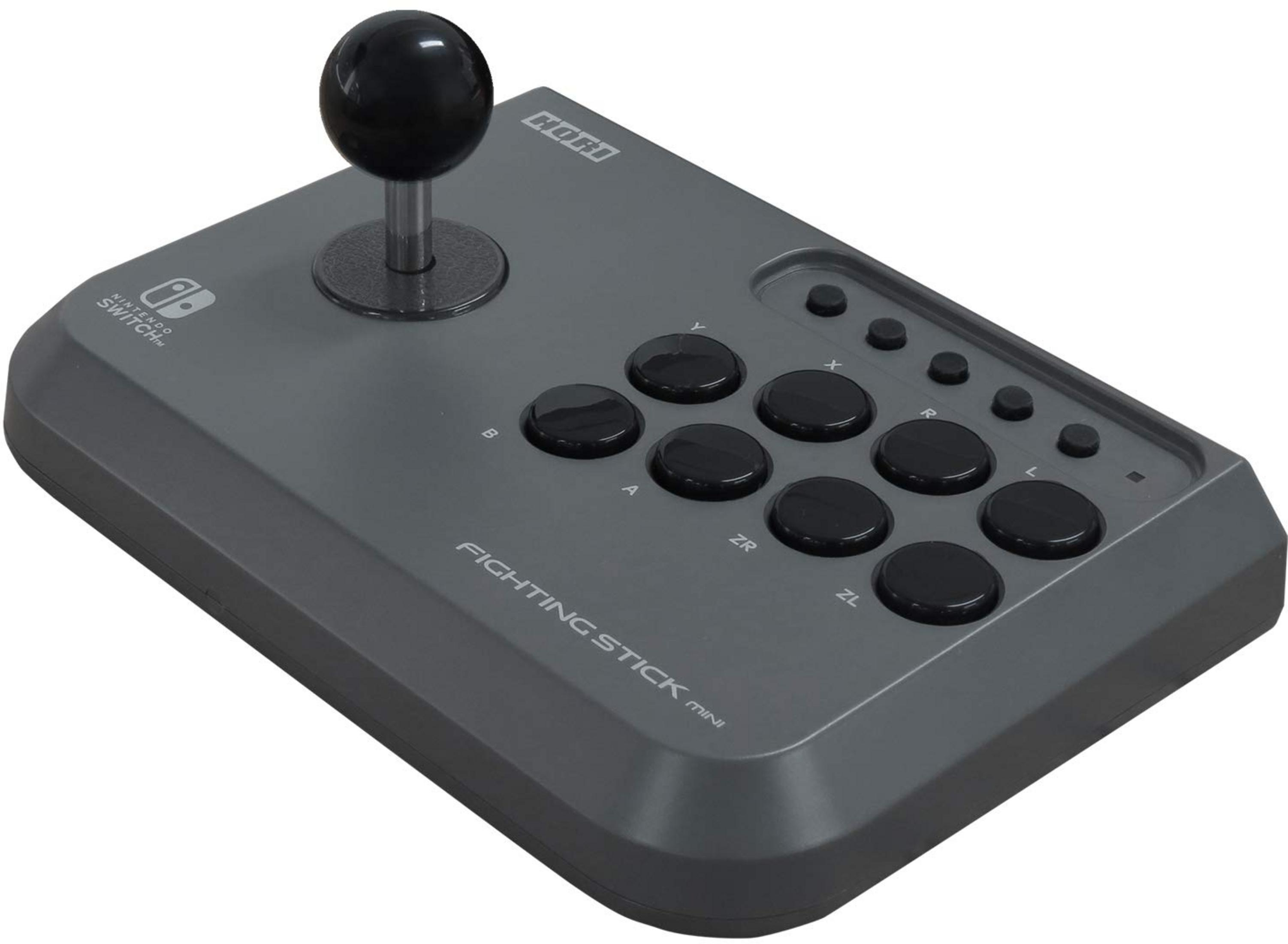 Szary kontroler bojowy Nintendo Switch z czarnym joystickiem i przyciskami.
