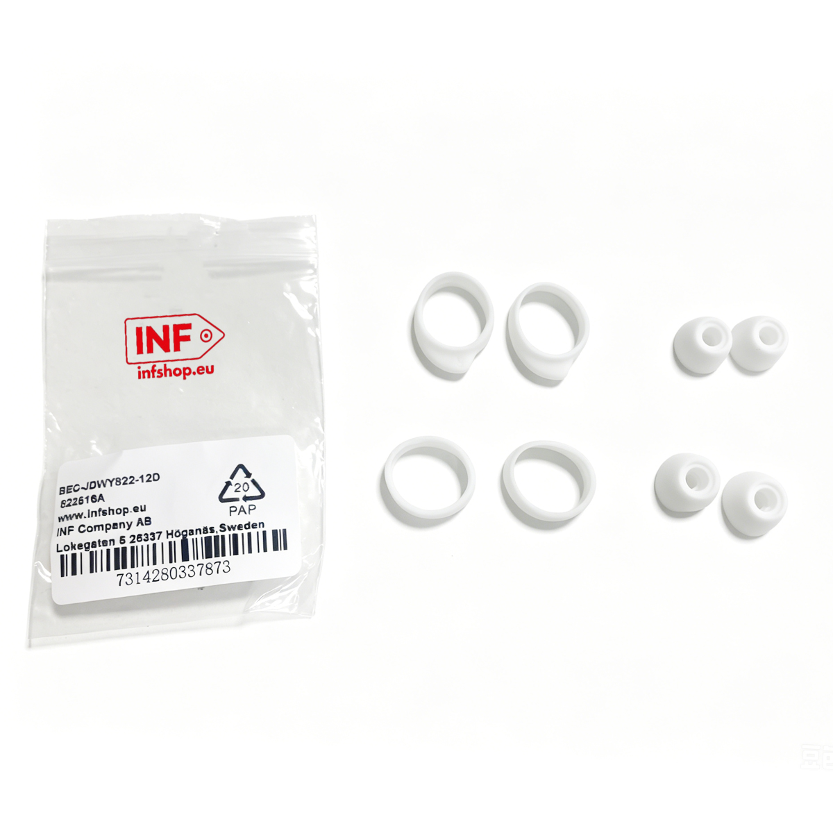 Weiße Ohrstöpsel und Ringe liegen neben einer Verpackung mit INF-Logo.