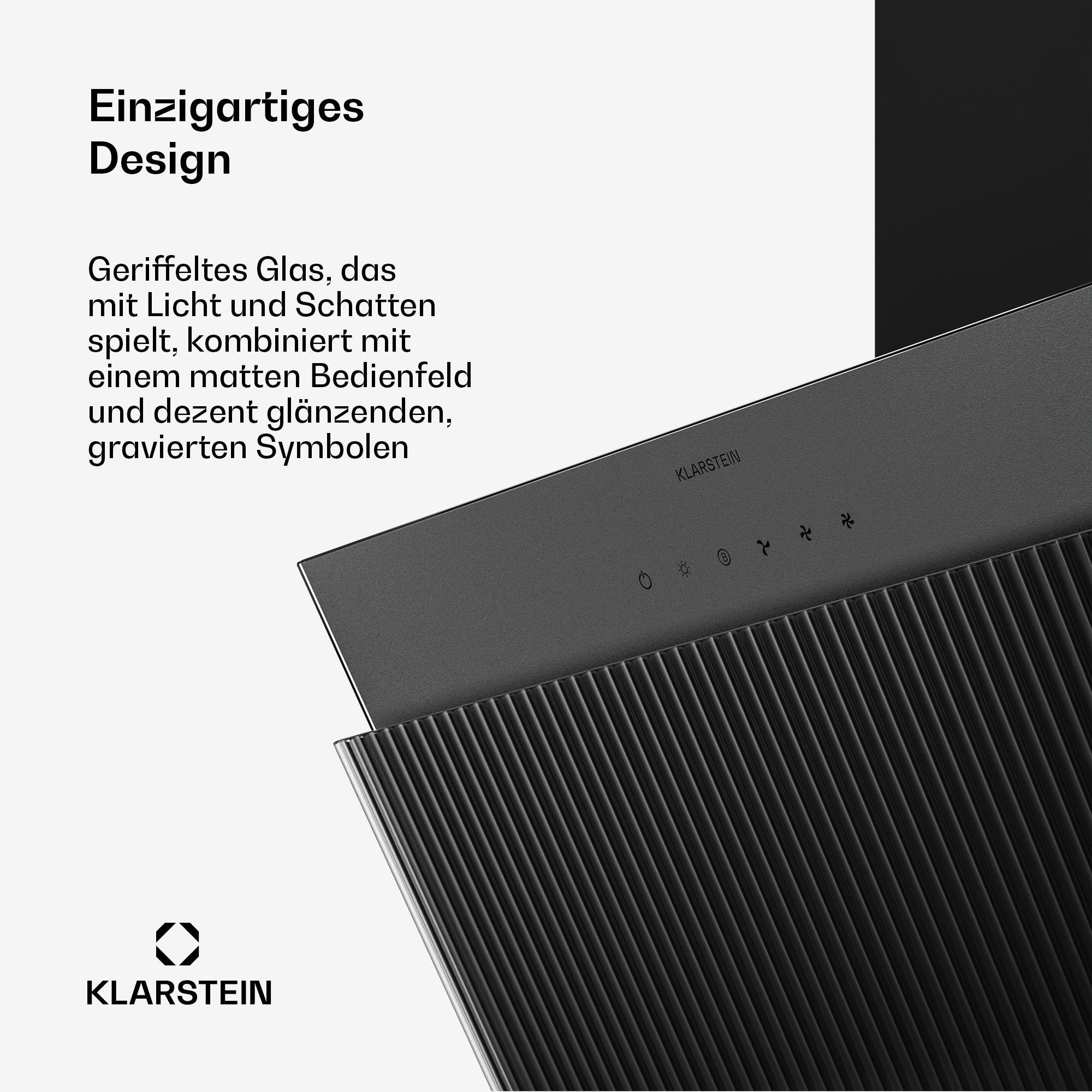 Dunstabzugshaube mit geriffeltem Glas, mattem Bedienfeld und Symbolen.