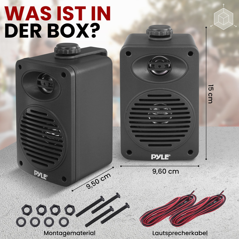 Zwei schwarze Lautsprecher, Schrauben, Muttern und Kabel auf grauem Untergrund.