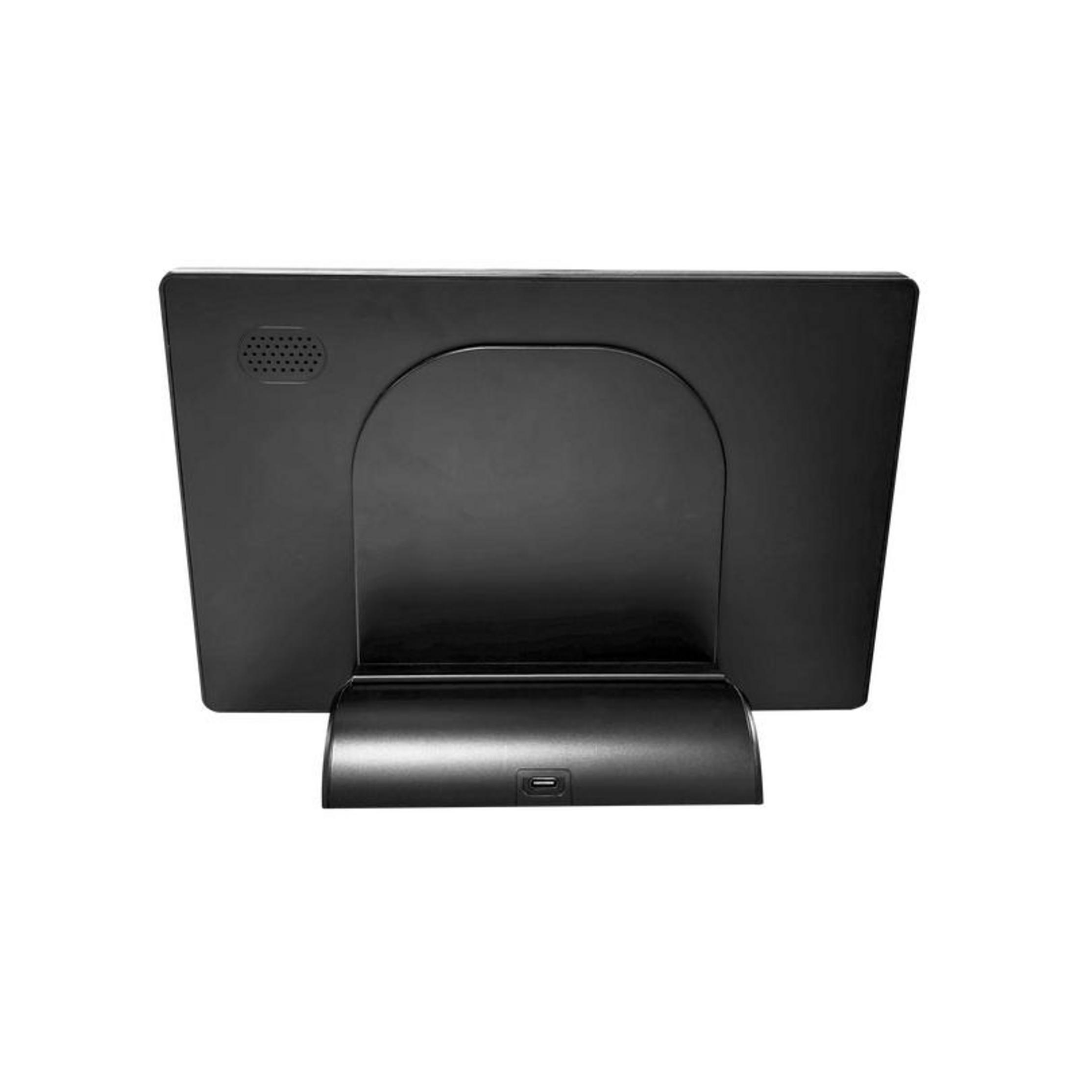 Rückseite eines schwarzen Monitors mit Lautsprechergitter und Ständer.