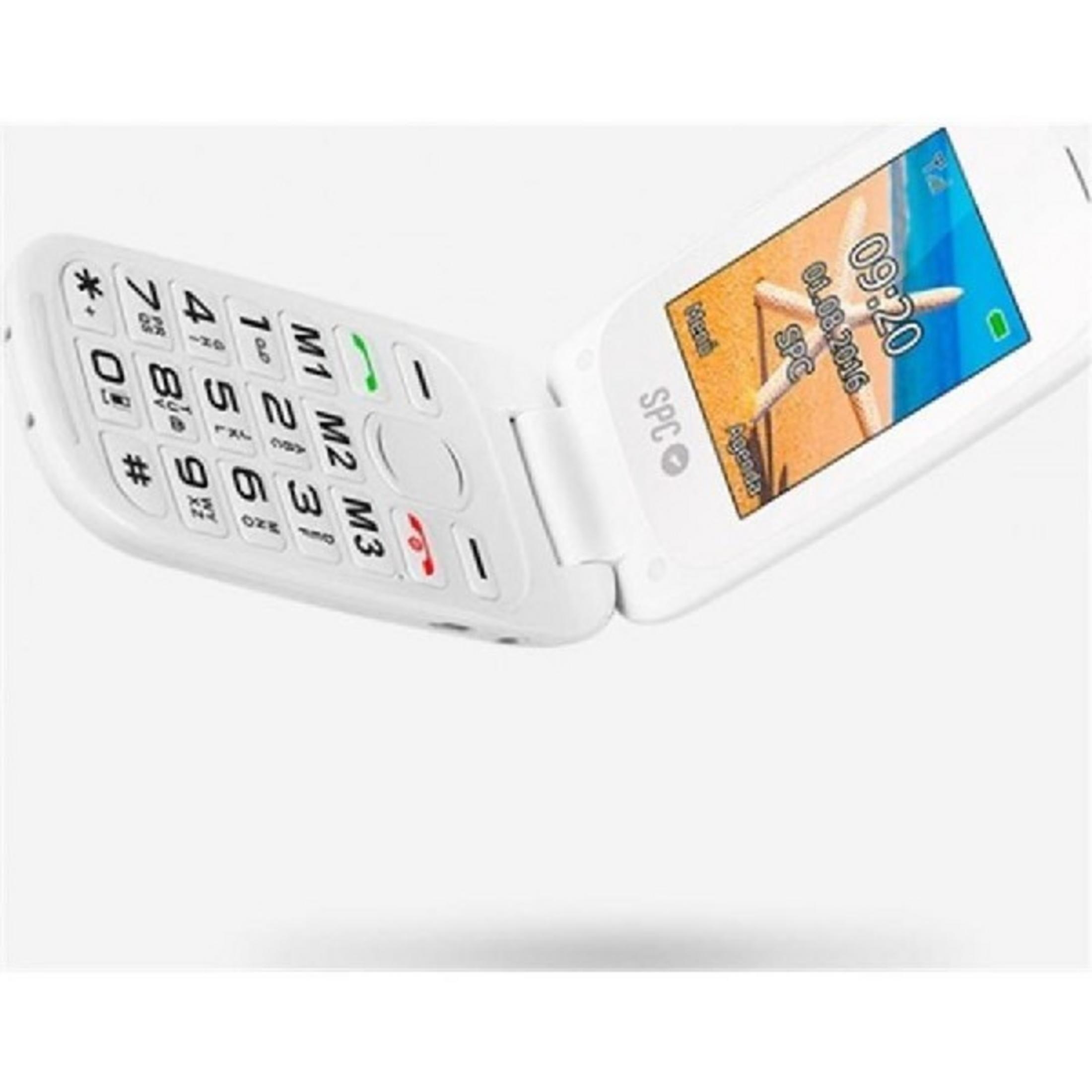 Un telefono flip bianco aperto con tastiera e schermo visibili.