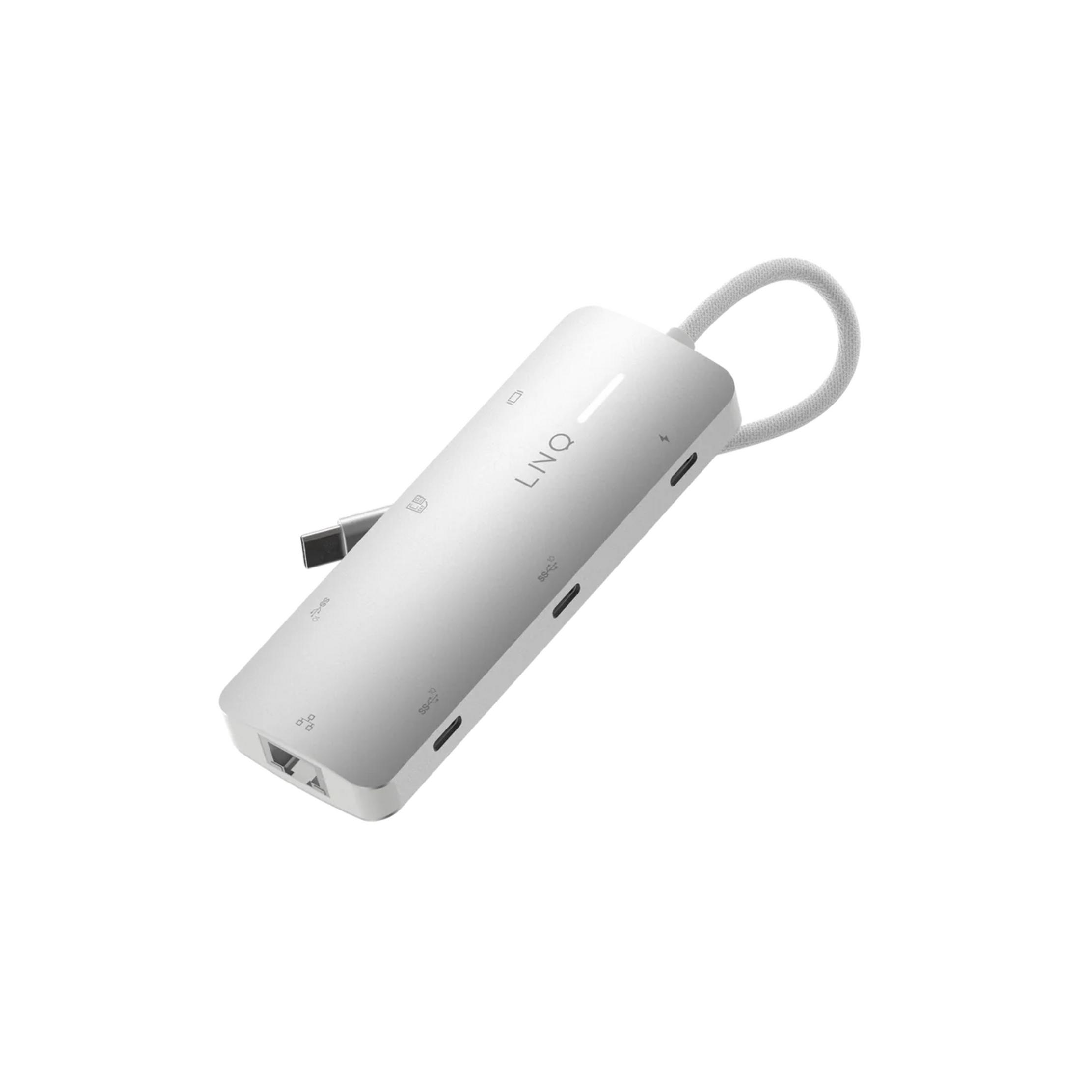 Hub USB-C argento con più porte e cavo intrecciato.