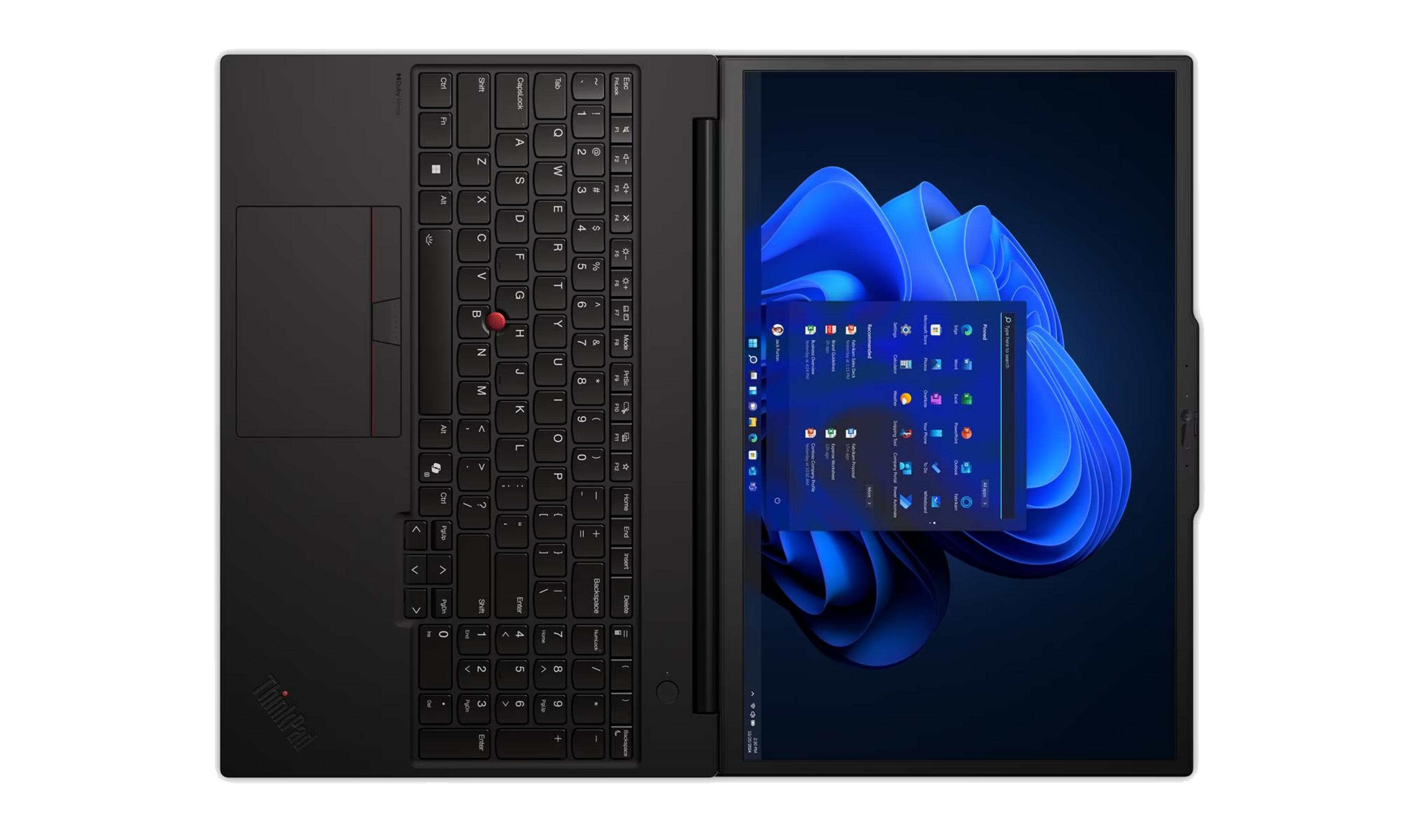 Un laptop nero con schermo illuminato che mostra Windows 11 con onde blu.