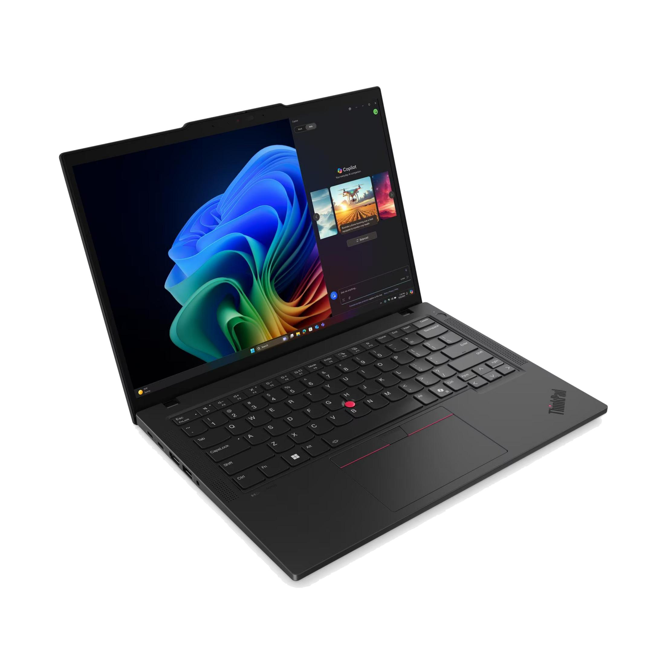 Un portátil negro con la pantalla abierta, mostrando un fondo de pantalla colorido y Copilot.