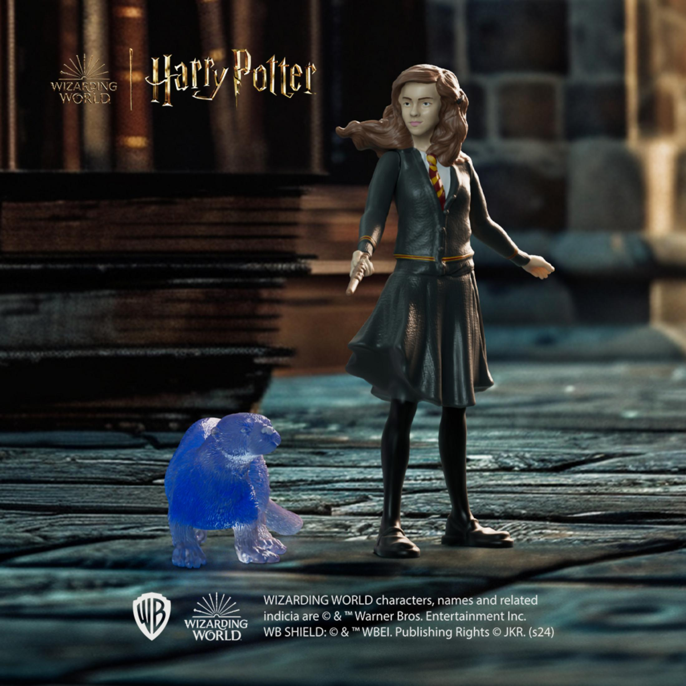 Statua di Hermione con un gufo blu accanto, con logo Harry Potter.