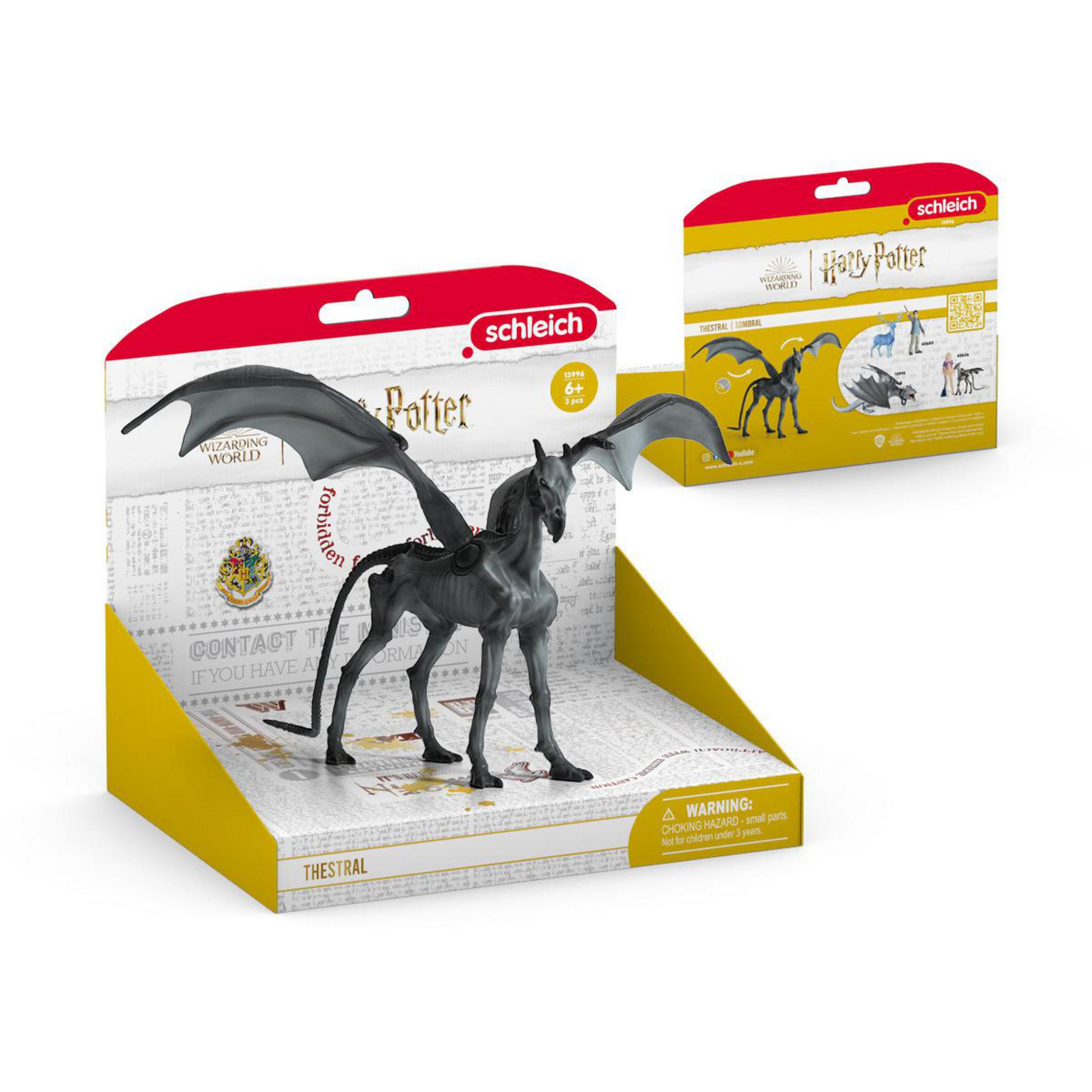Un giocattolo Thestral grigio e alato di Harry Potter, nella sua confezione.