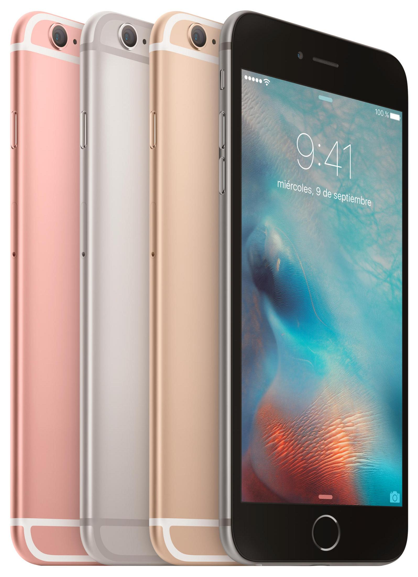 Quattro iPhone in oro rosa, argento e oro allineati su sfondo bianco.
