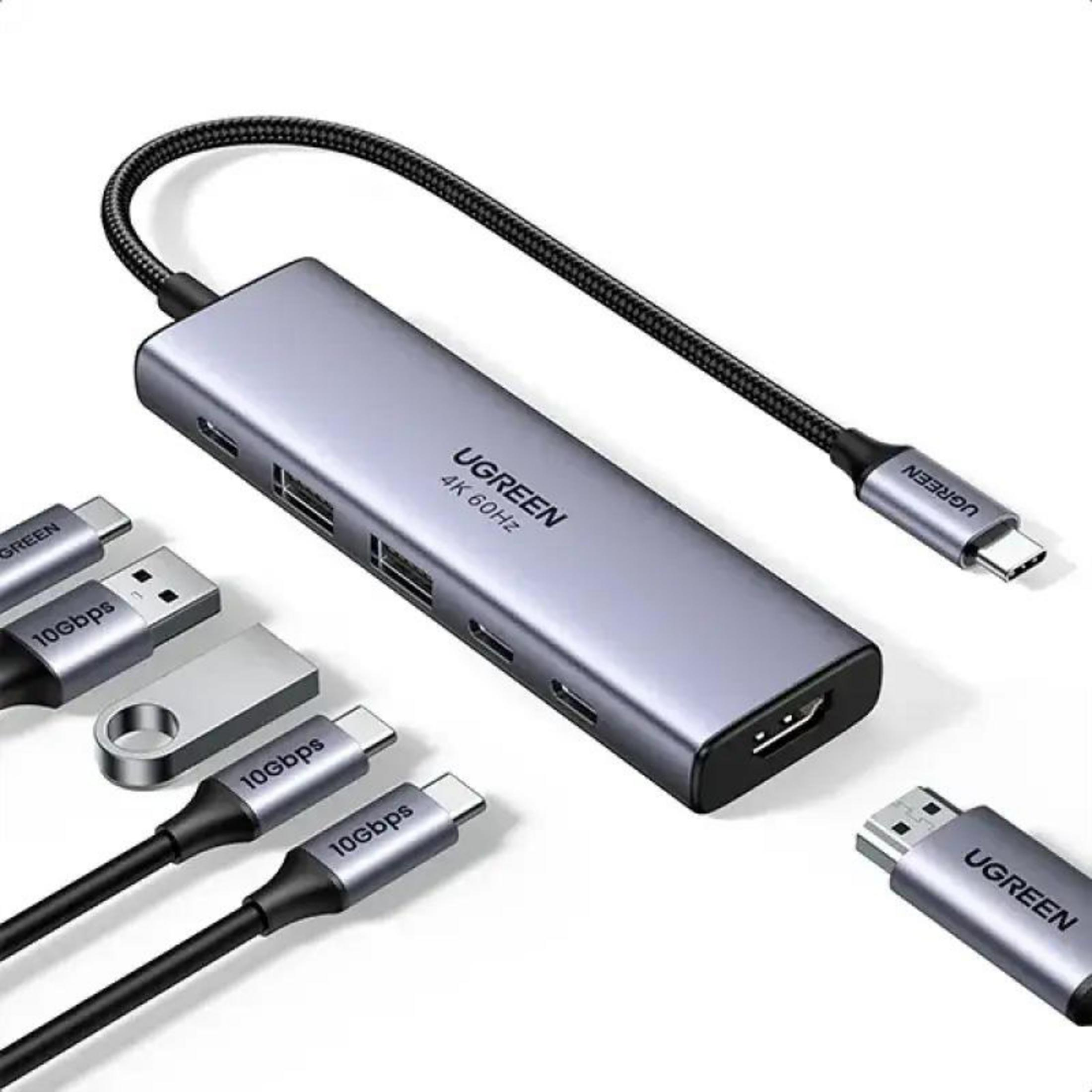 USB-C kablolu ve çoklu bağlantı noktasına sahip gri UGREEN hub.