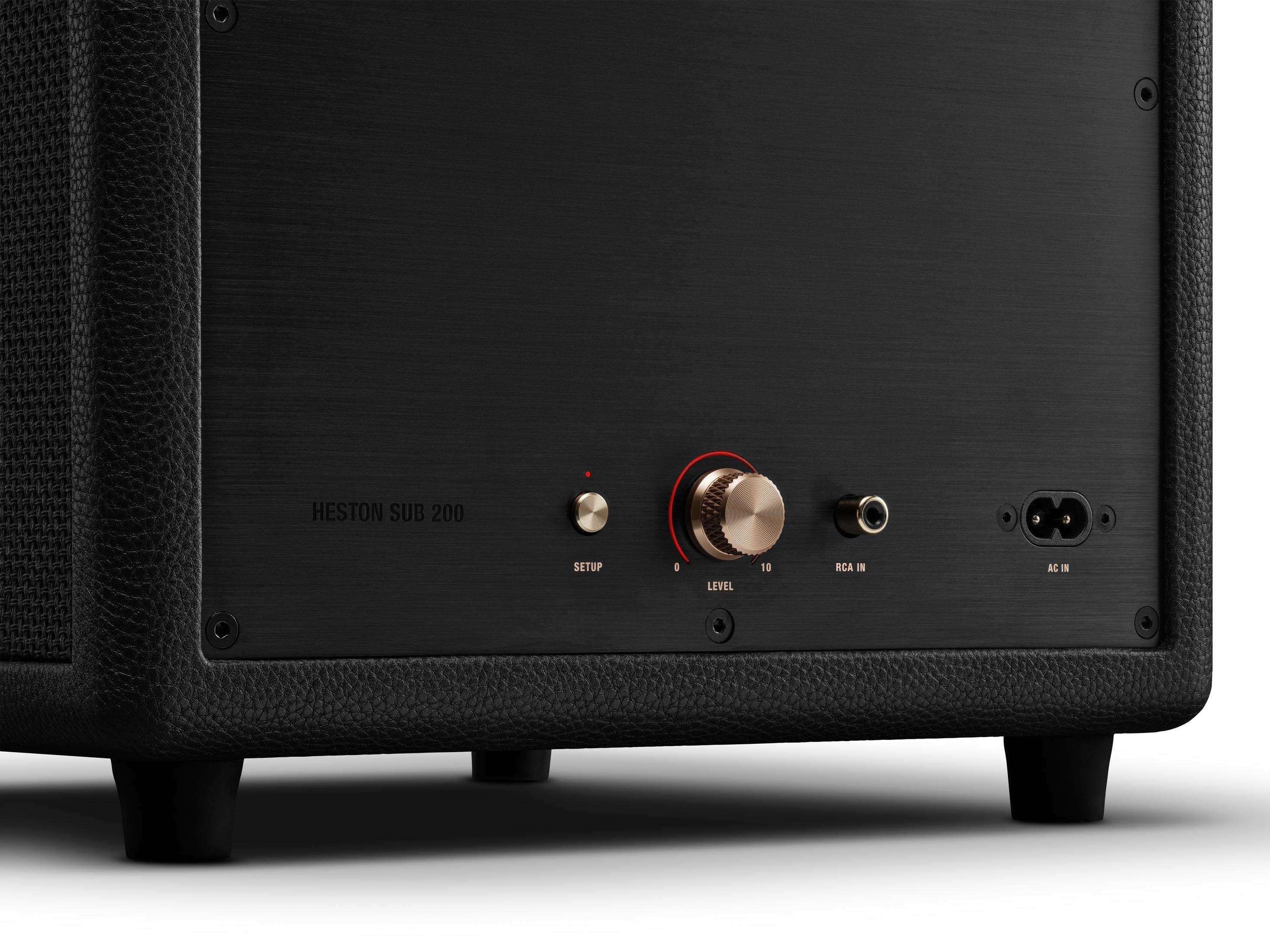 Retro di un subwoofer nero con manopole e porte.