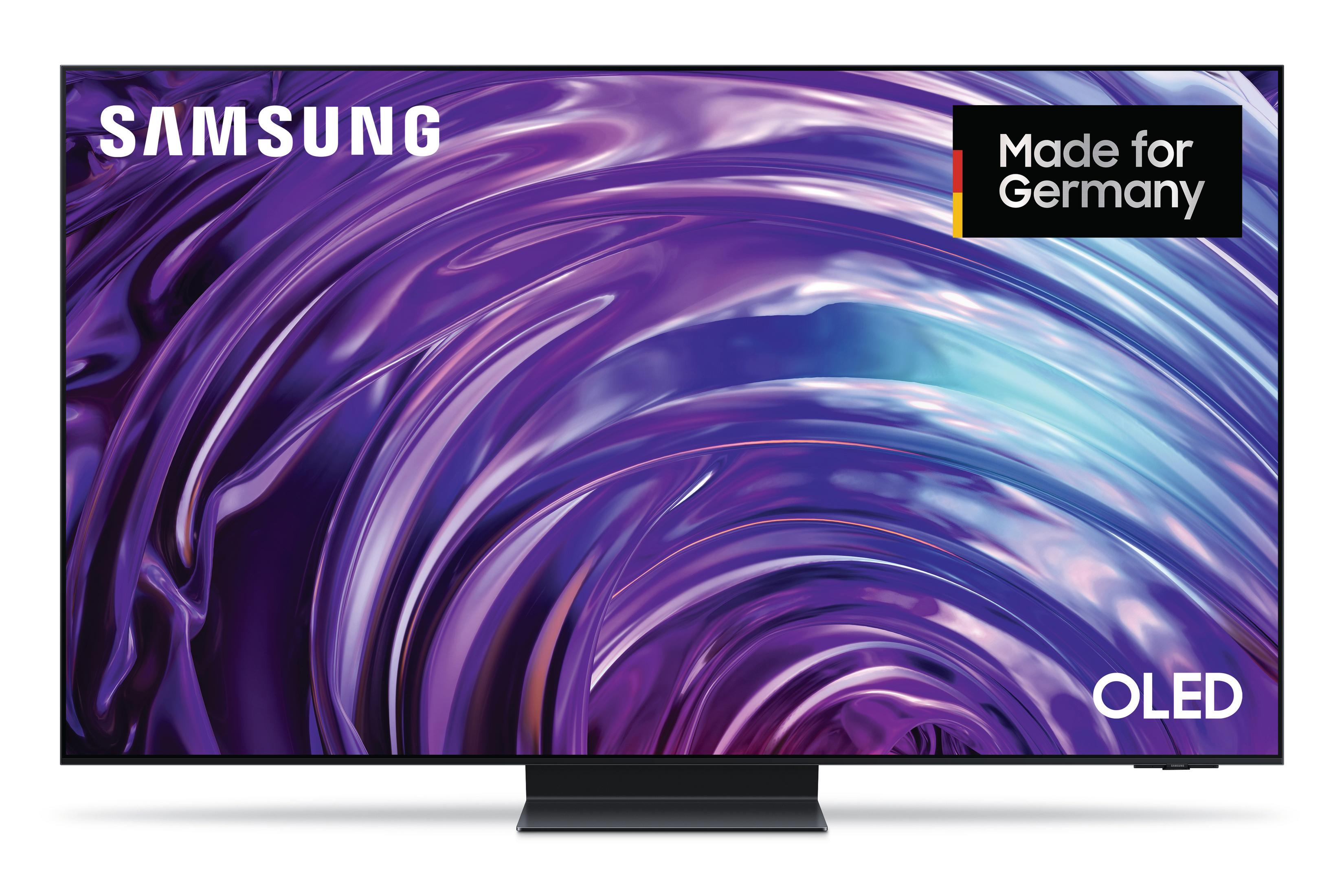 Una TV Samsung OLED mostra un motivo ondulato viola e blu e "Made for Germany".