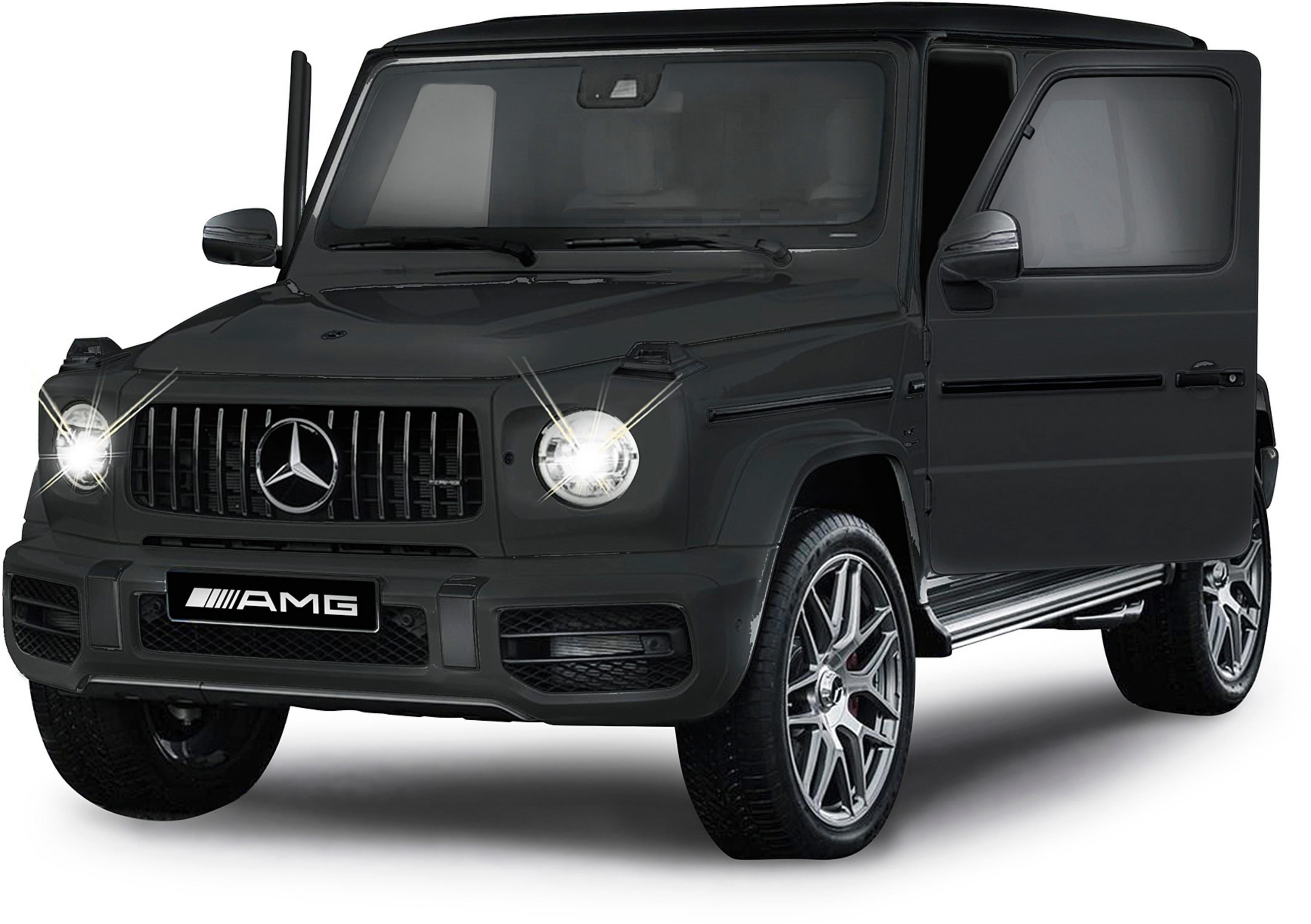 Mercedes-AMG G63 negro con puertas abiertas y faros encendidos.