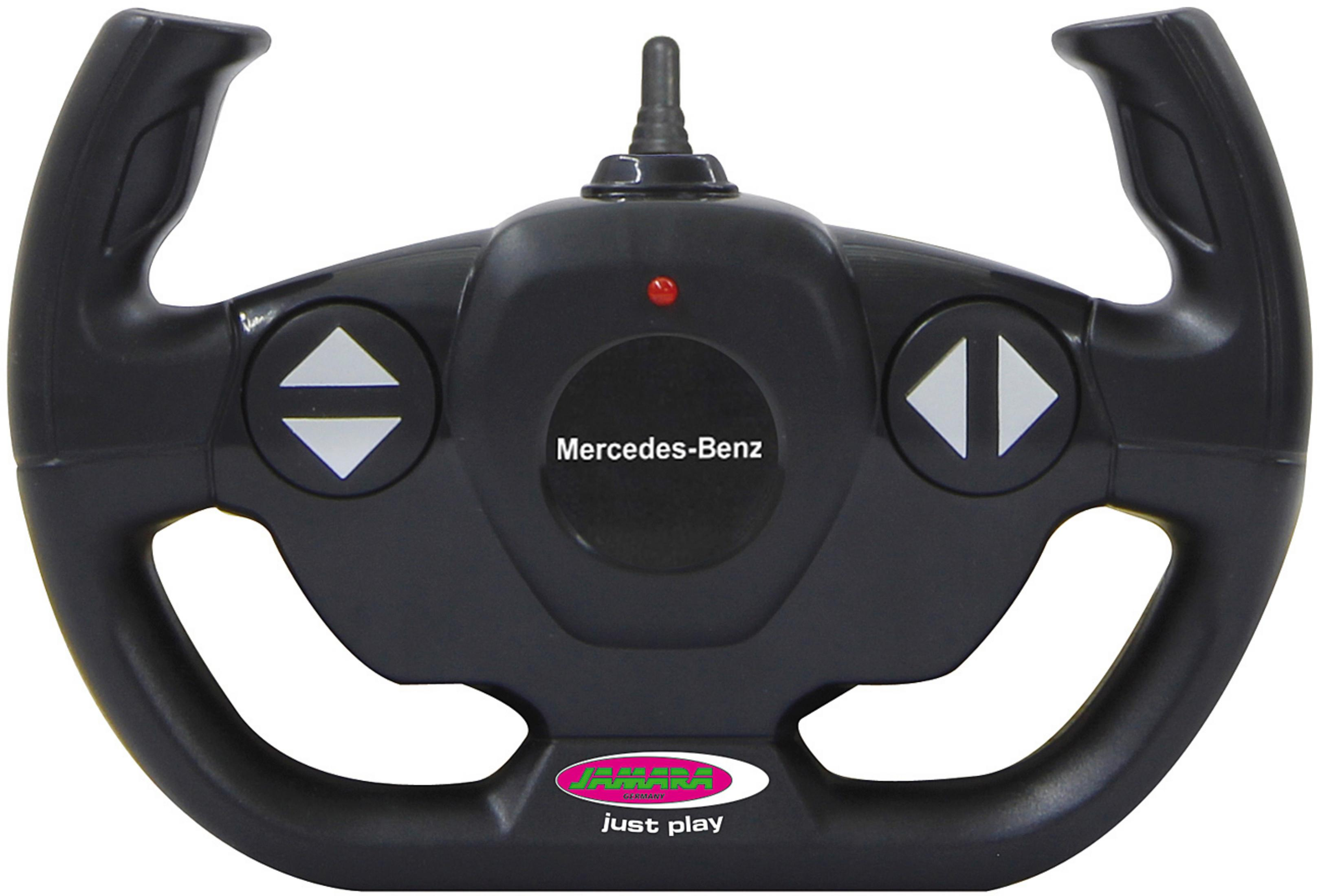 Volante de control remoto Mercedes-Benz negro con botones y antena.