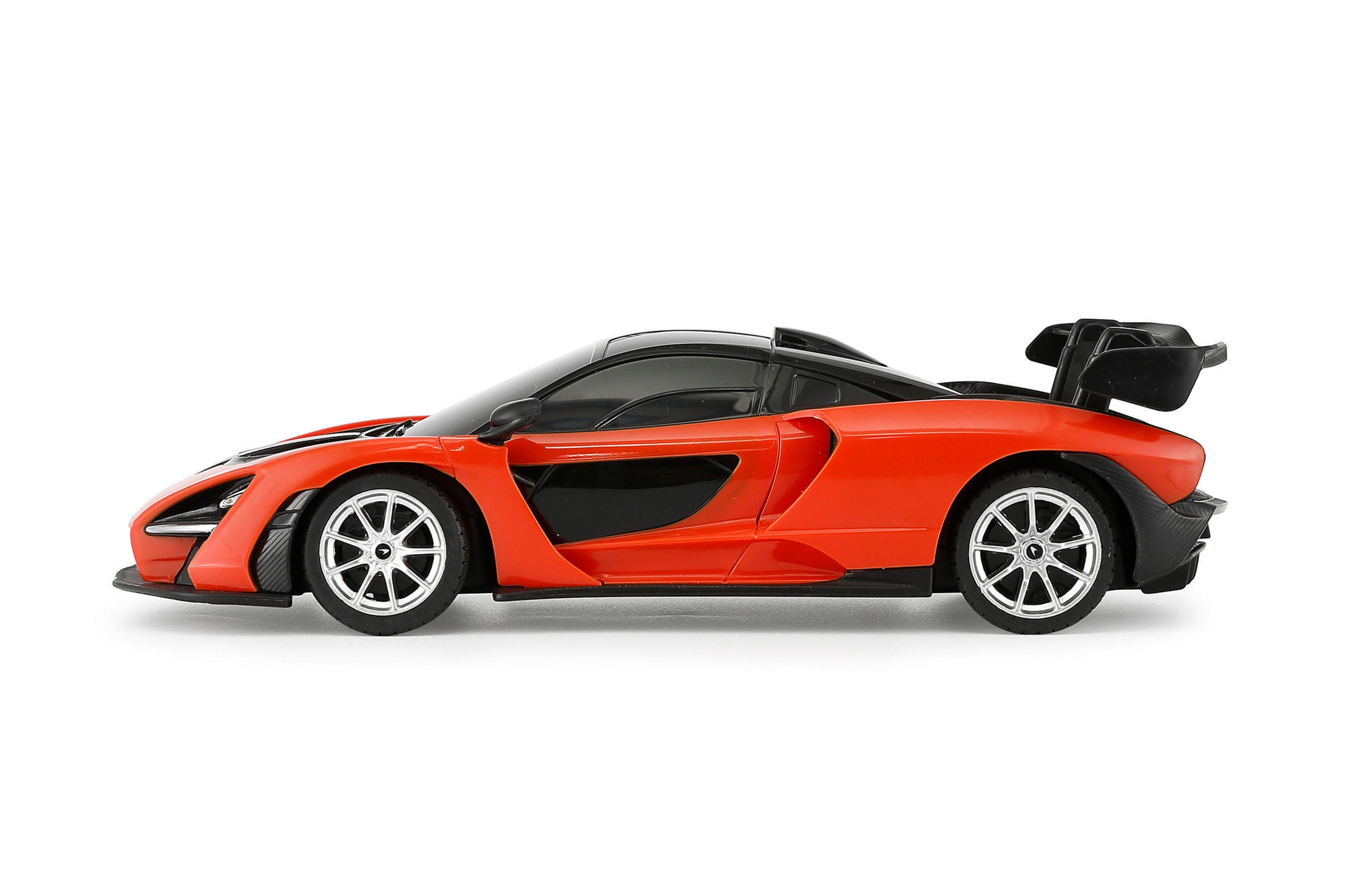 Ein orangefarbener Sportwagen mit schwarzem Dach und Heckspoiler auf weißem Hintergrund.