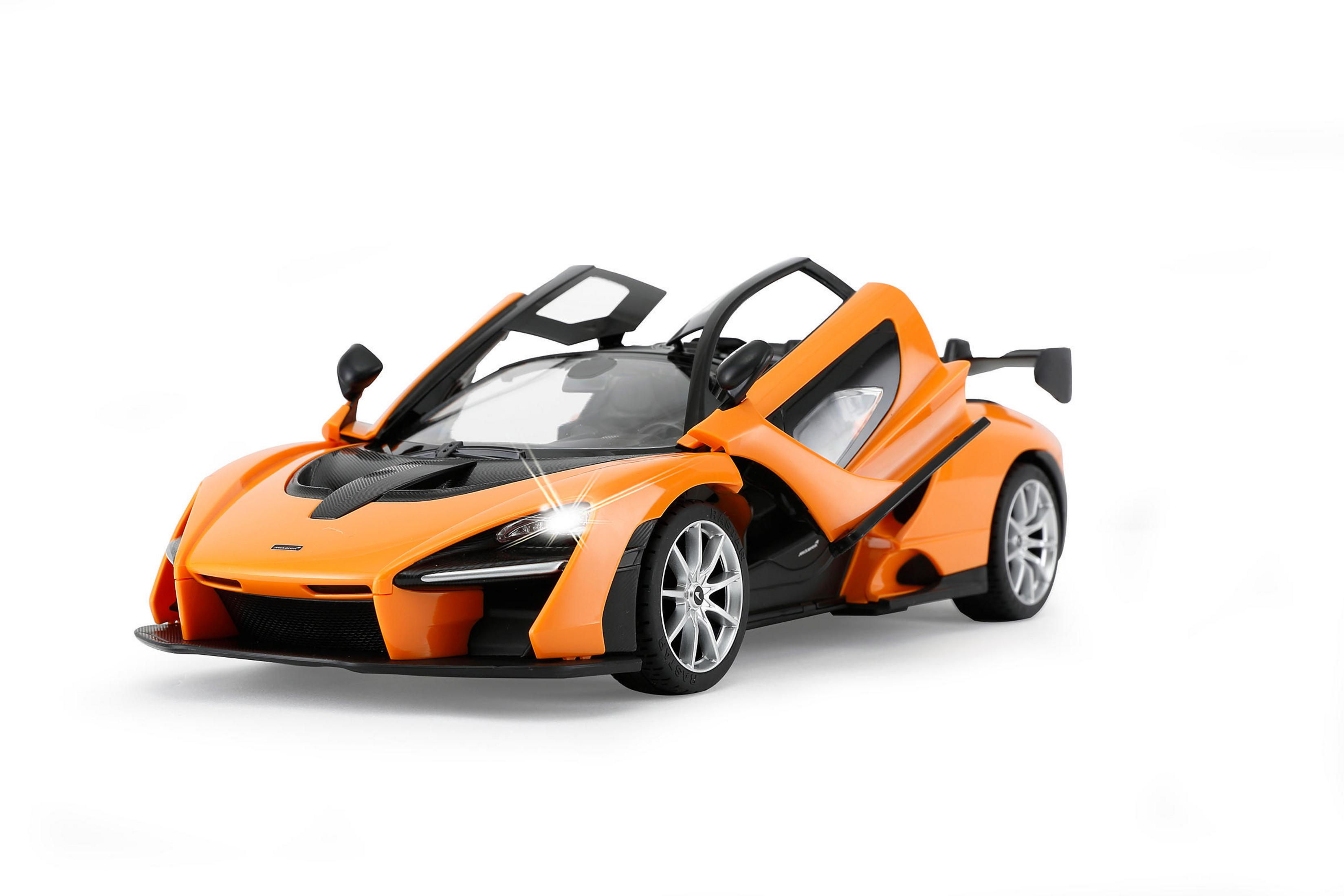 Ein orangefarbenes Spielzeugauto mit geöffneten Türen auf weißem Hintergrund.