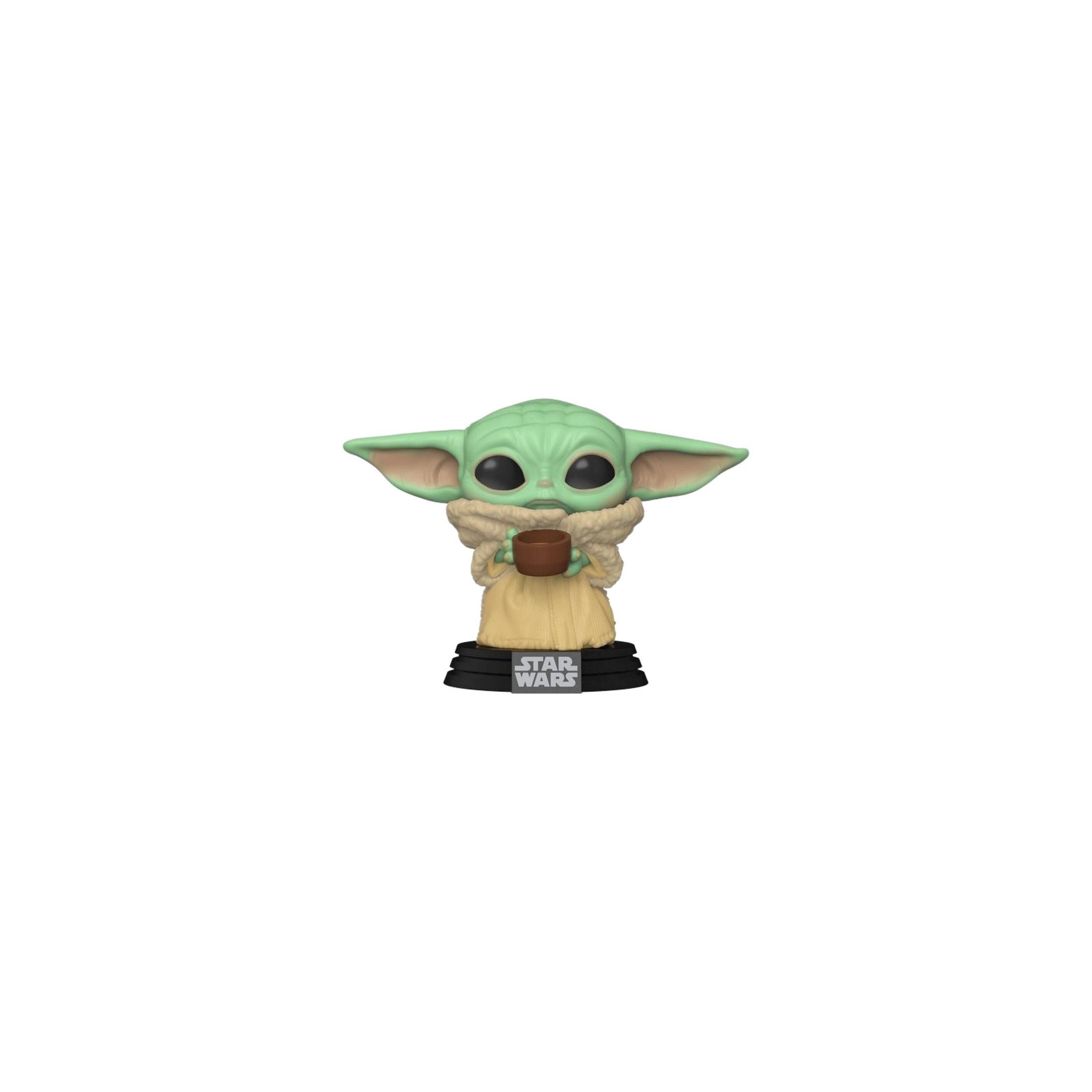 Una figura verde con grandi orecchie tiene una tazza su una base "Star Wars".