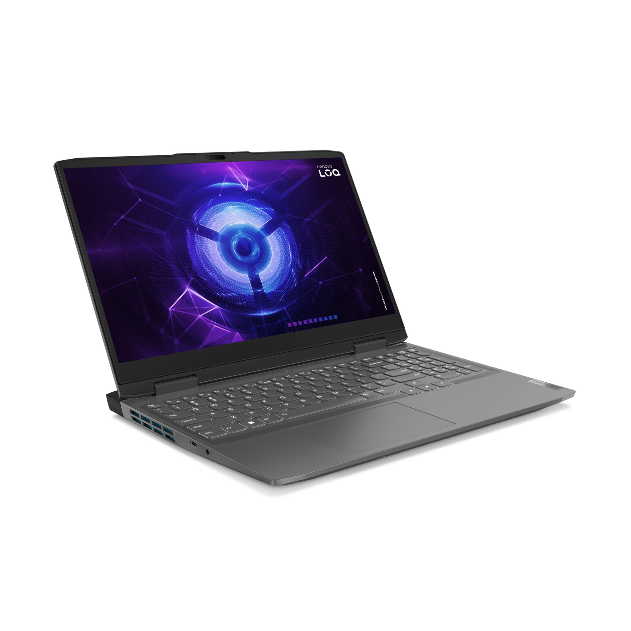 Un portátil Lenovo gris con teclado retroiluminado y gráficos azul-morados en pantalla.