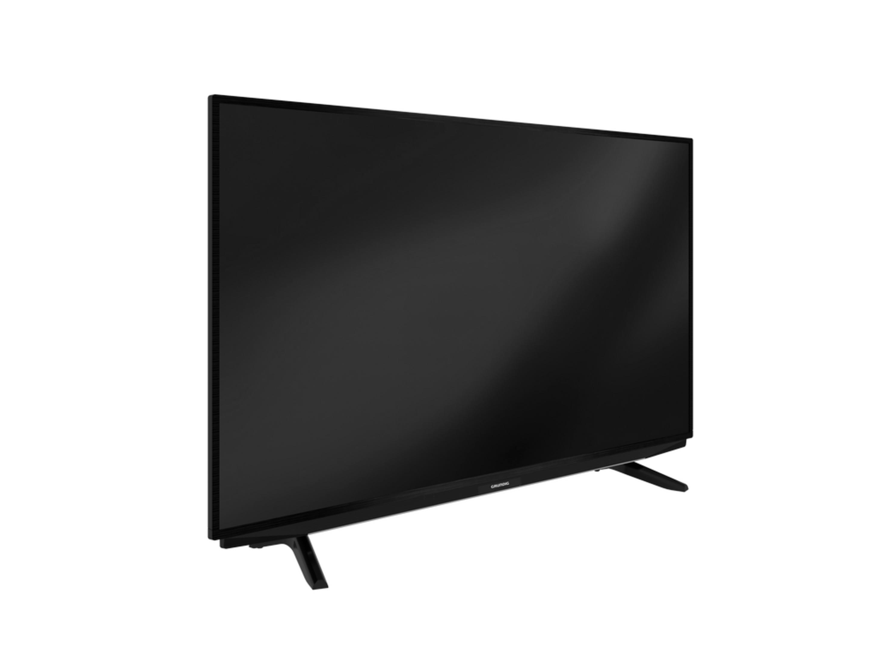 Un televisor negro con bisel fino se apoya en dos patas delgadas.