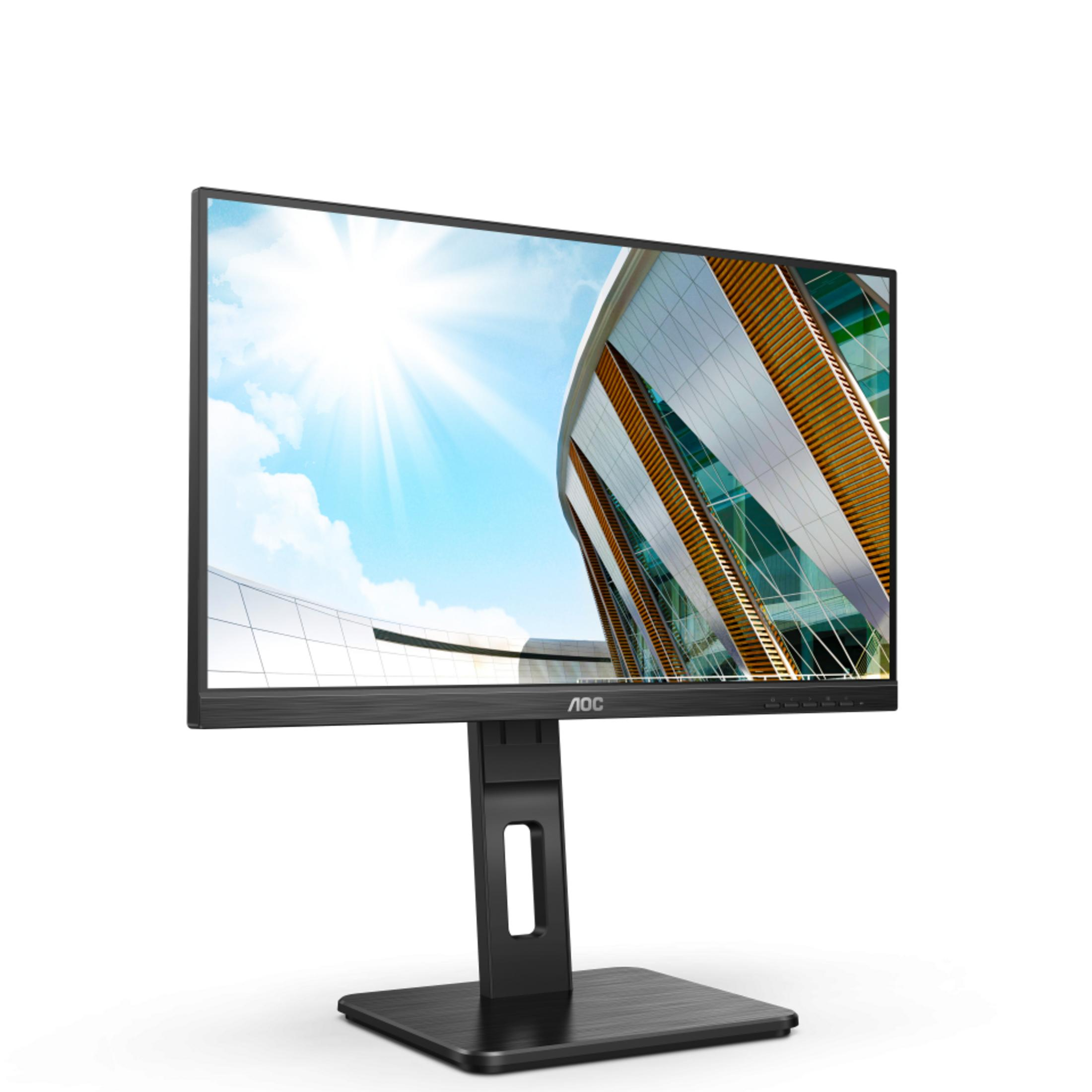 Un monitor negro que muestra un edificio moderno contra un cielo azul.