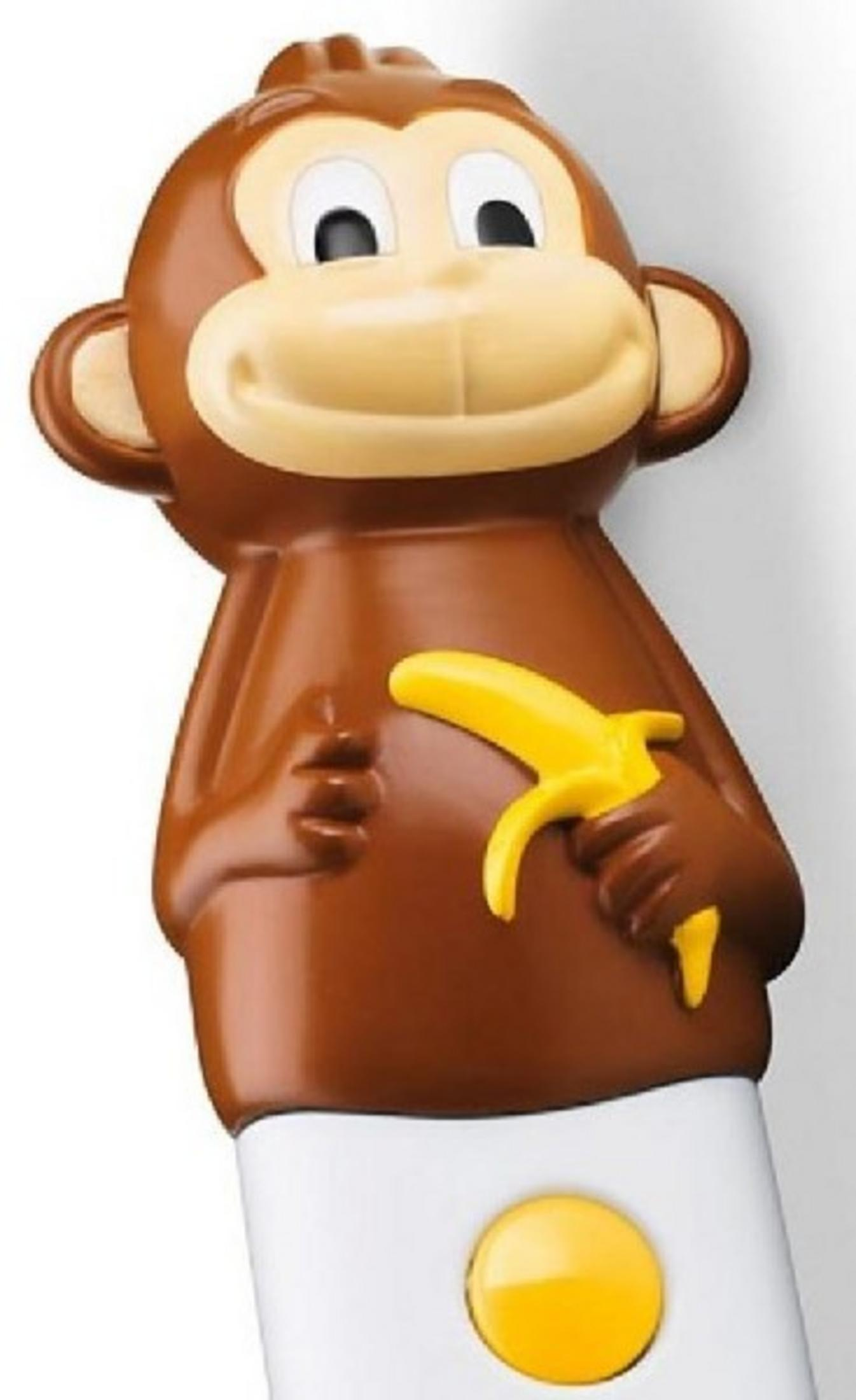 Eine braune Affenfigur hält eine gelbe Banane. Ein gelber Knopf ist unten.