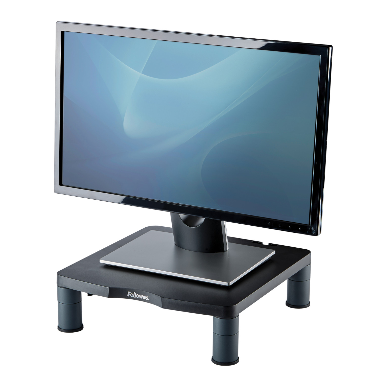 Ein schwarzer Monitor steht auf einem schwarzen Monitorständer mit vier Beinen.