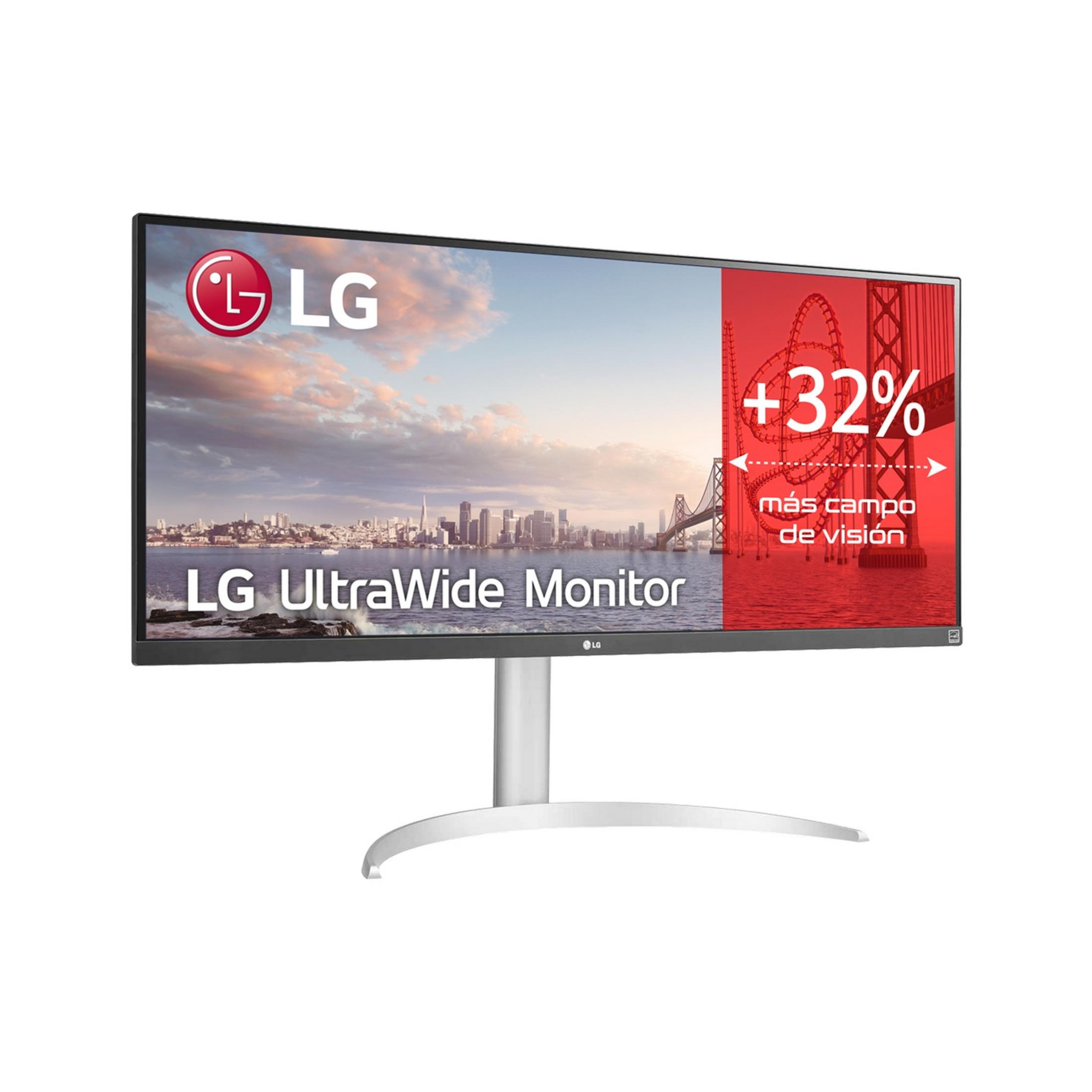 Un monitor LG UltraWide con ciudad y puente junto al mar. 32% más campo de visión.