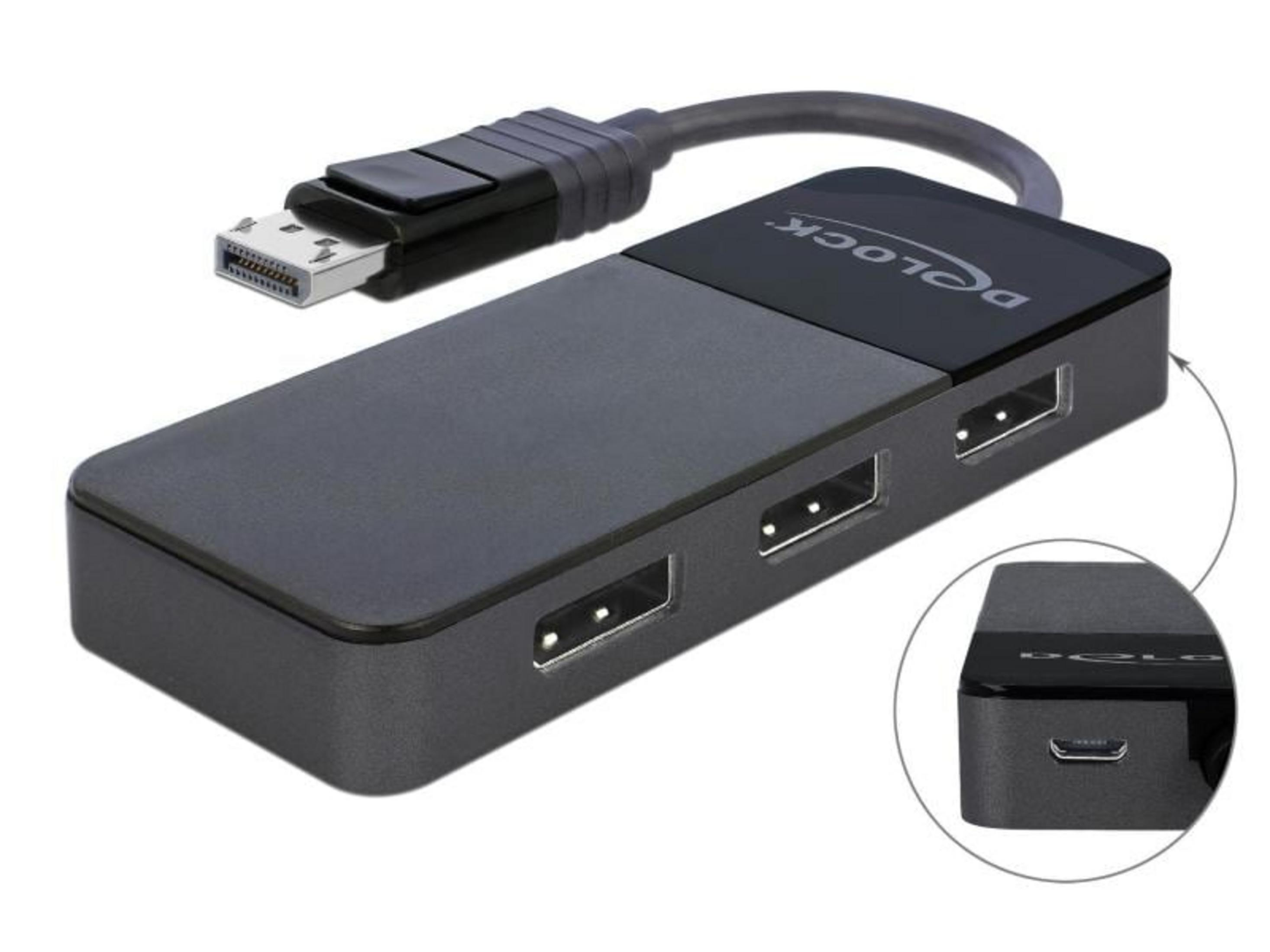 Ein schwarzer Delock-Adapter mit DisplayPort-Stecker und USB-A-Anschlüssen.