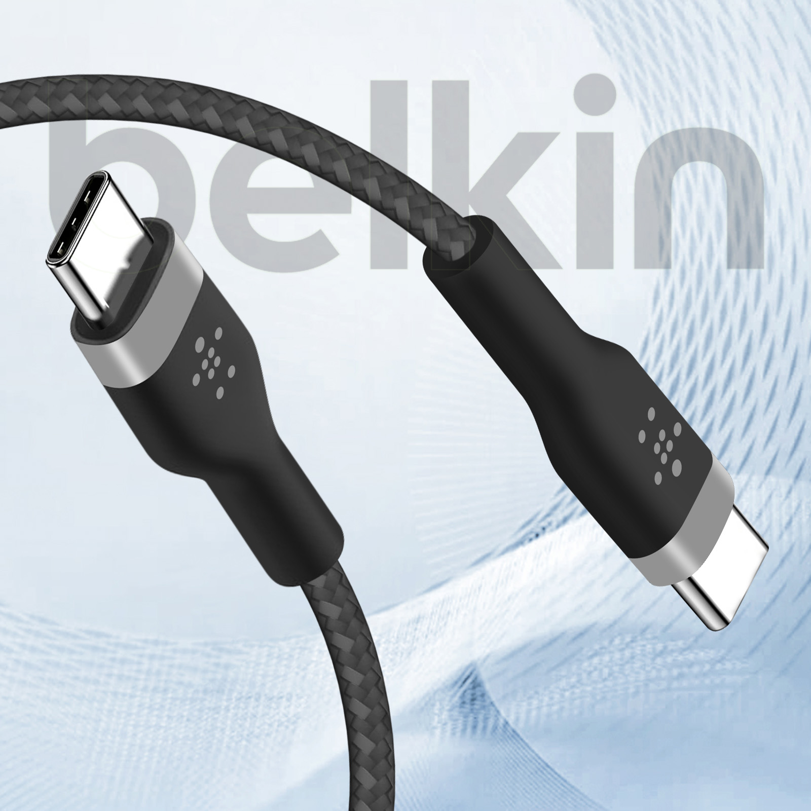 Ein schwarzes USB-C-Kabel mit silbernen Anschlüssen und dem Belkin-Logo auf grauem Hintergrund.