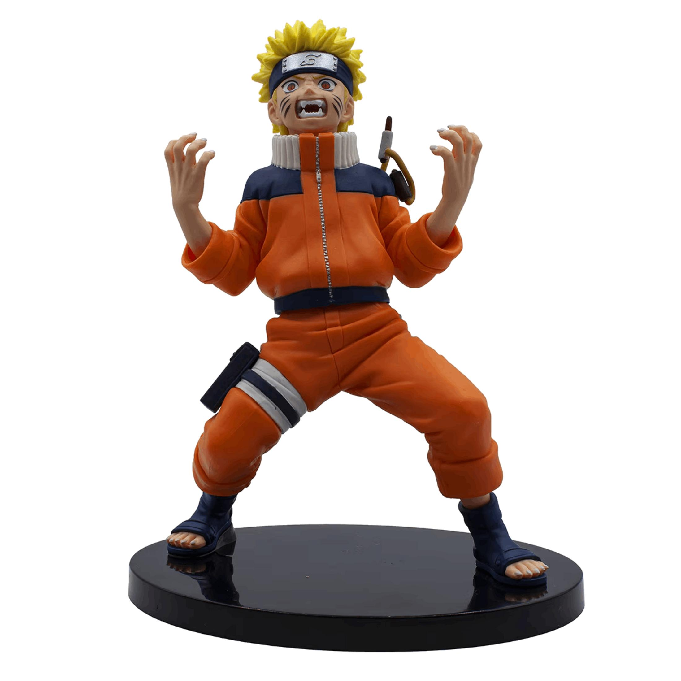 Eine Actionfigur von Naruto mit gelben Haaren und orangefarbener Kleidung.