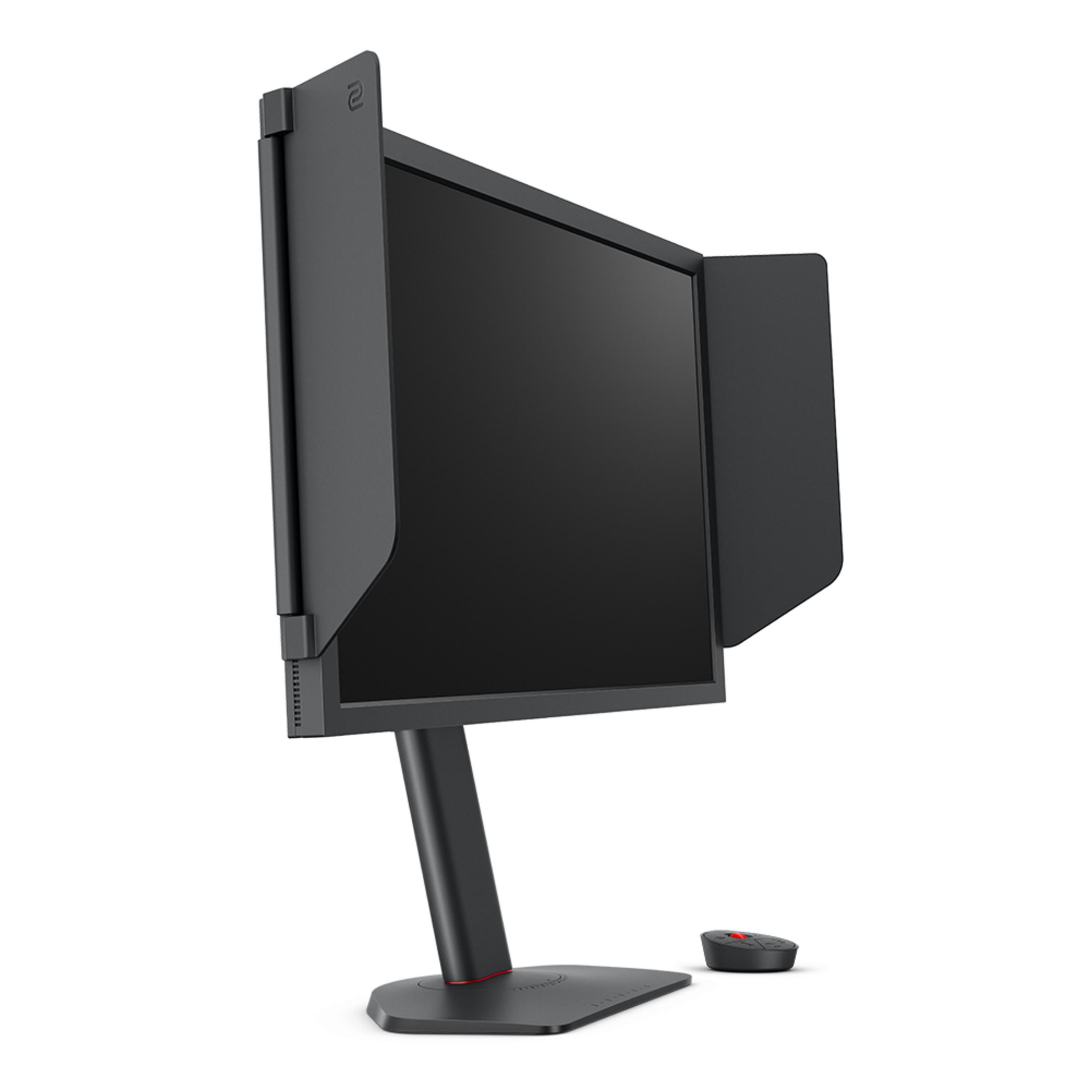 Un monitor negro con viseras y un pequeño dispositivo negro con detalles rojos.
