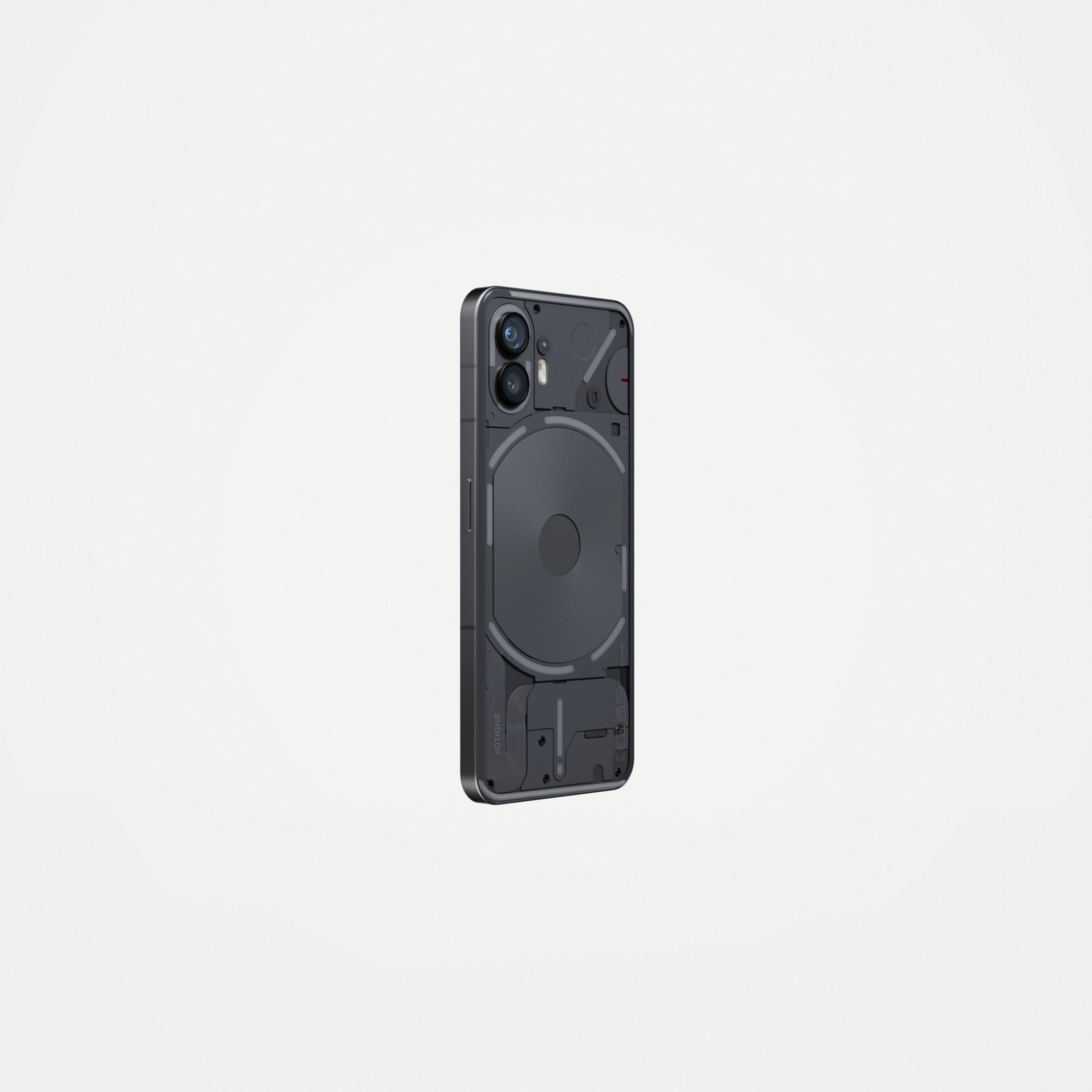 Un smartphone gris oscuro con parte trasera transparente que muestra componentes internos.