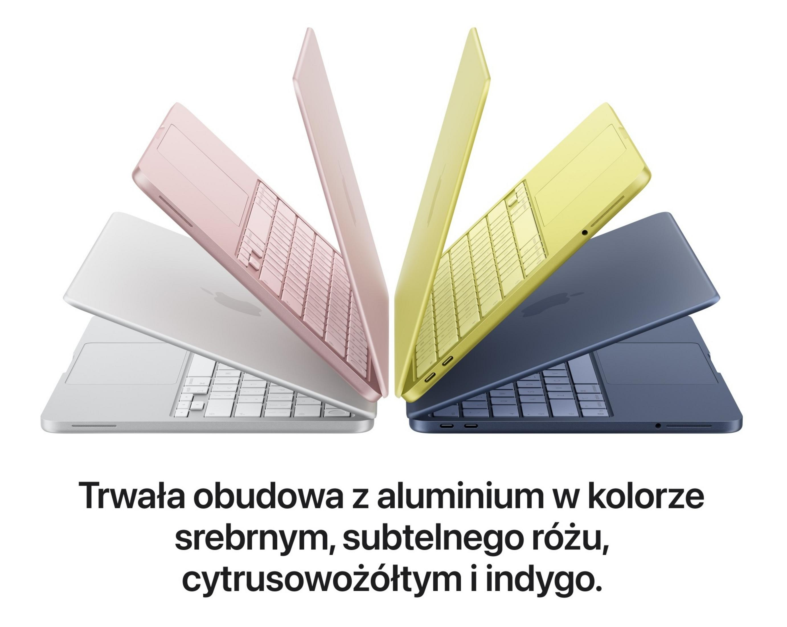Vier Laptops in Rosa, Gelb, Dunkelblau und Silber, mit geöffnetem Deckel.