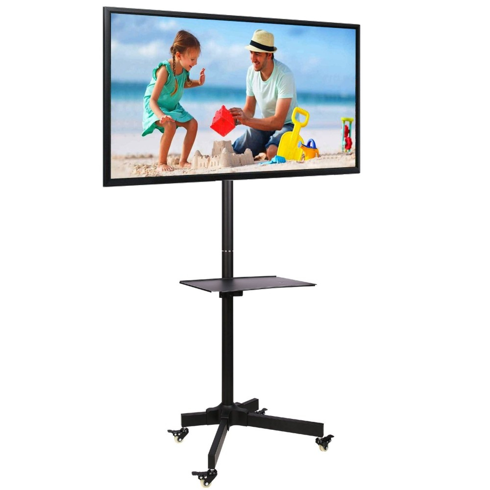 Un TV a schermo piatto su un supporto mobile mostra un padre e una figlia che costruiscono un castello di sabbia su una spiaggia.