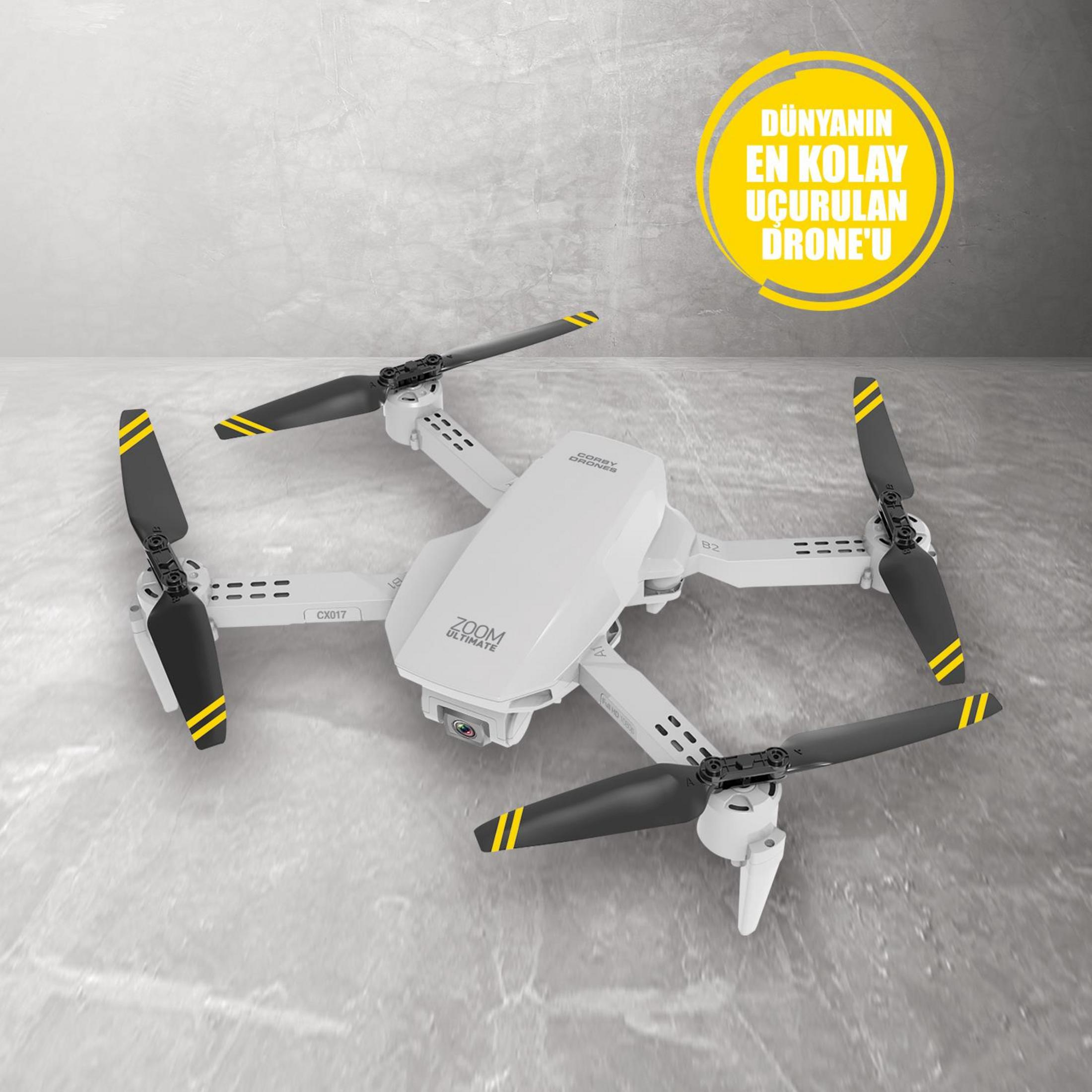 Sarı şeritli siyah pervanelere sahip beyaz katlanabilir drone.
