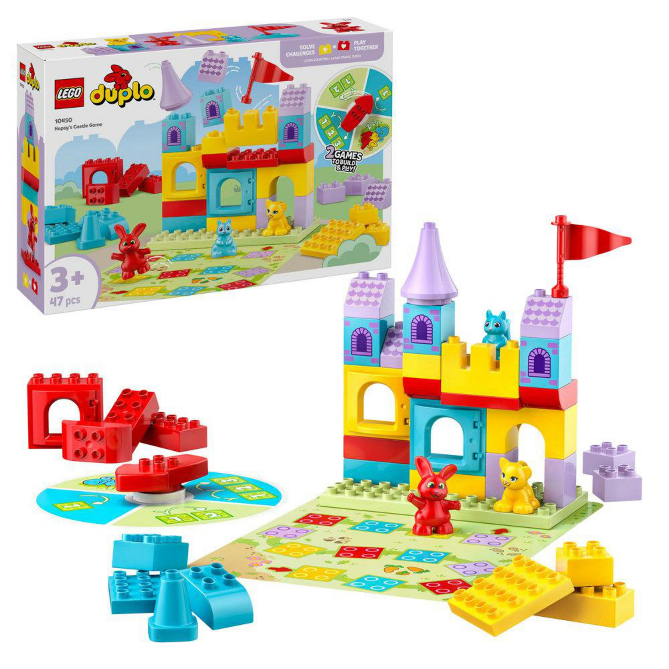 Un colorido castillo LEGO Duplo con figuras y tablero de juego.
