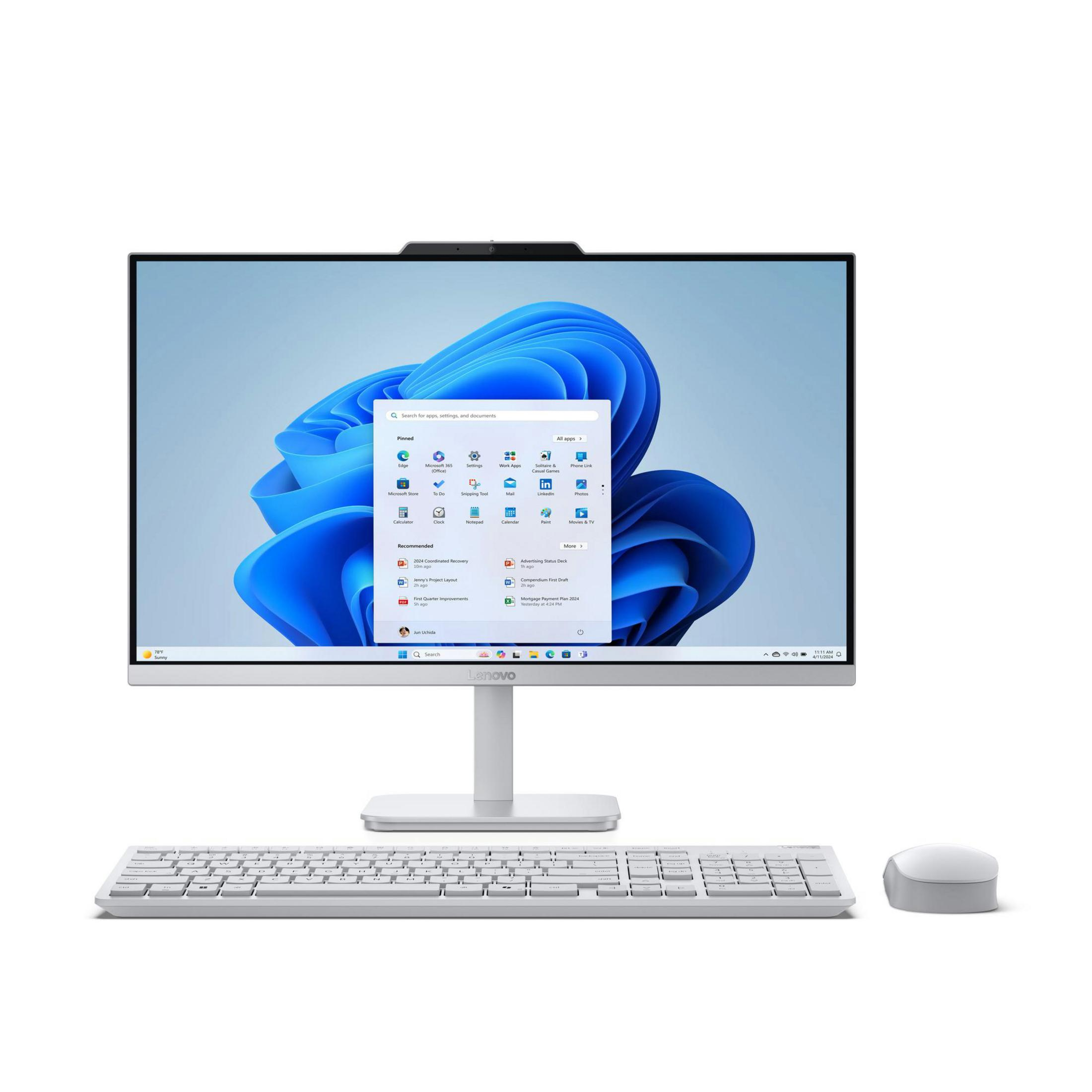 Ein weißer All-in-One-Computer mit Tastatur und Maus auf weißem Hintergrund.