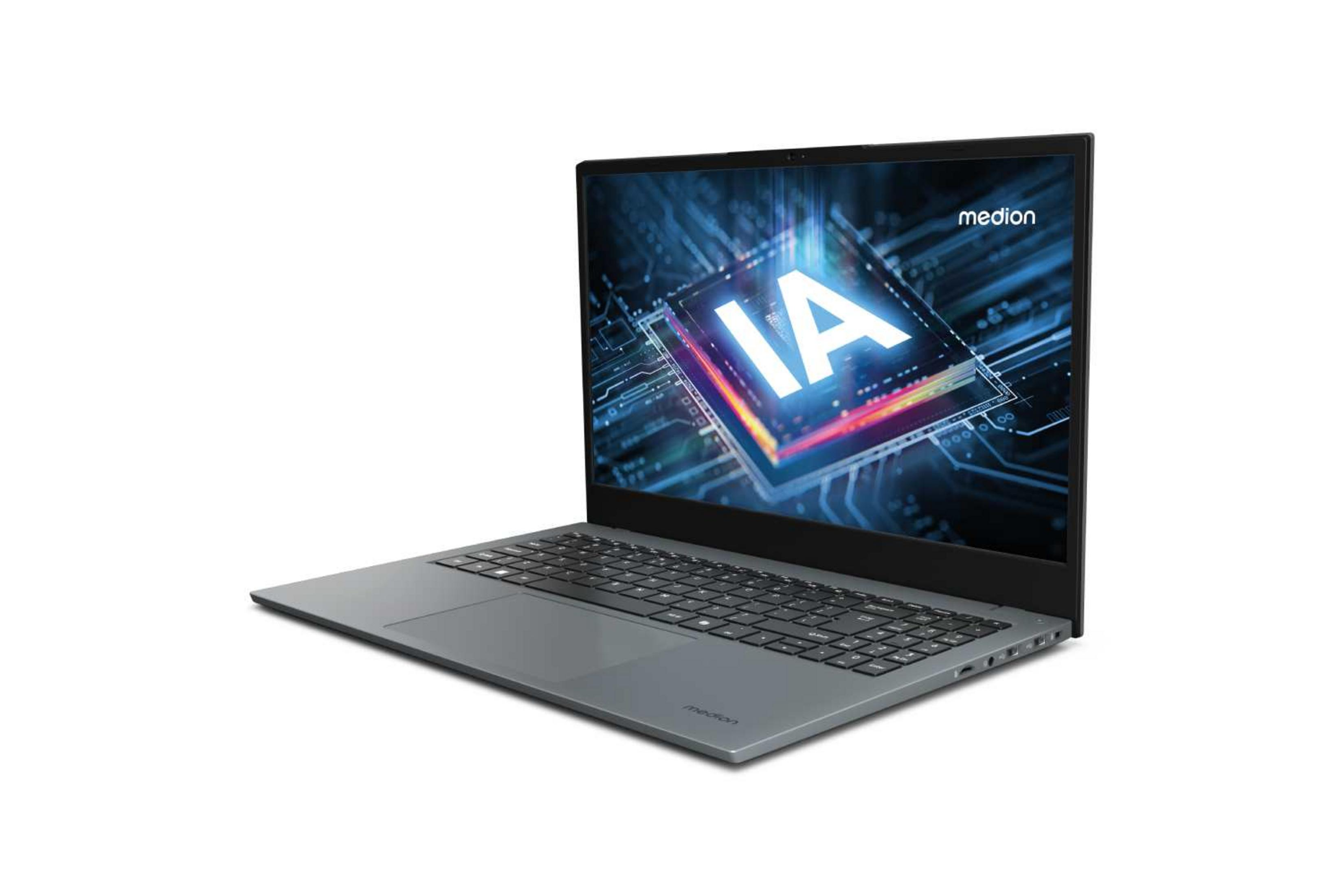 Szary laptop z podświetlanym ekranem pokazującym logo Medion i "IA".