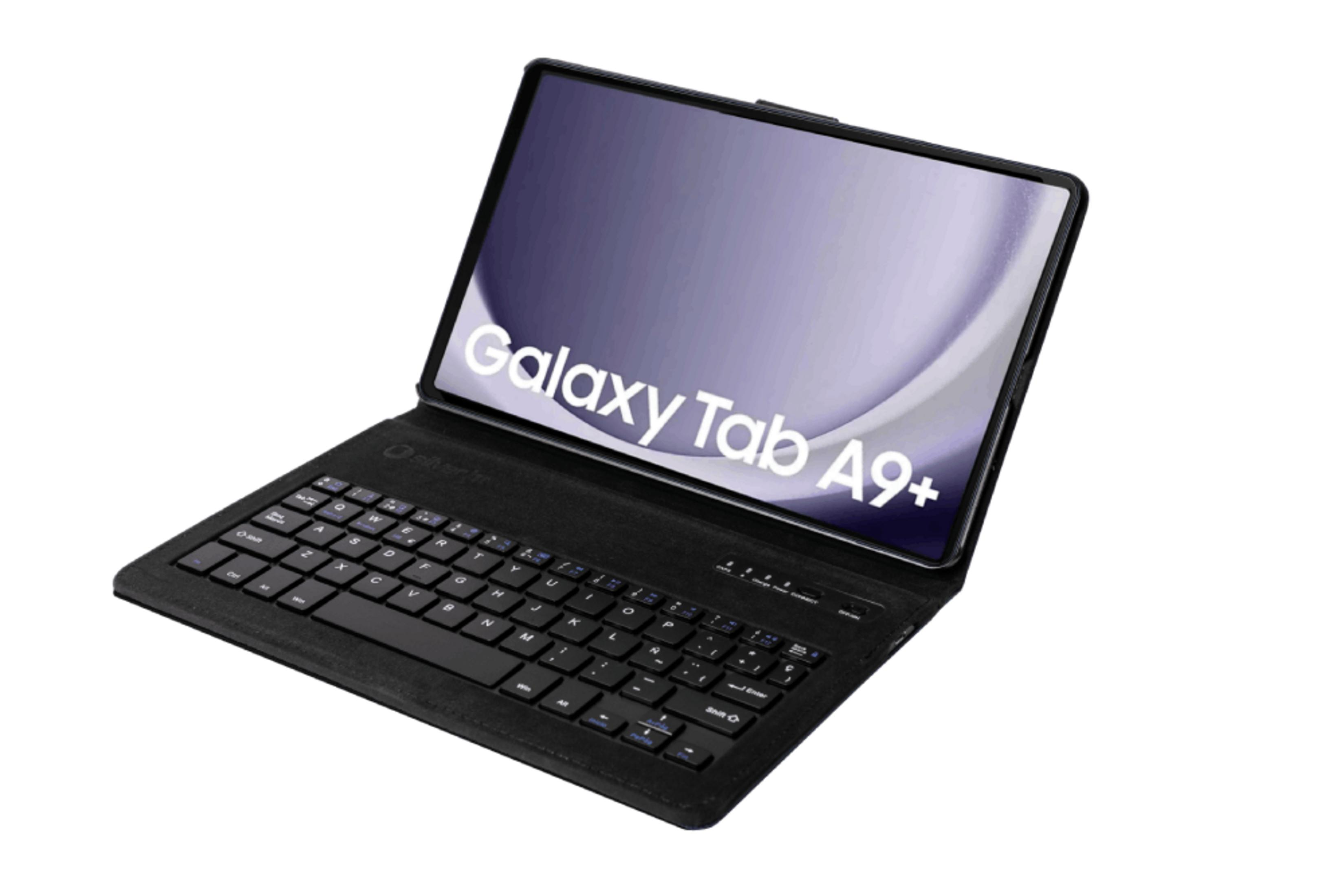 Una tableta negra con funda de teclado, apoyada sobre una superficie blanca.