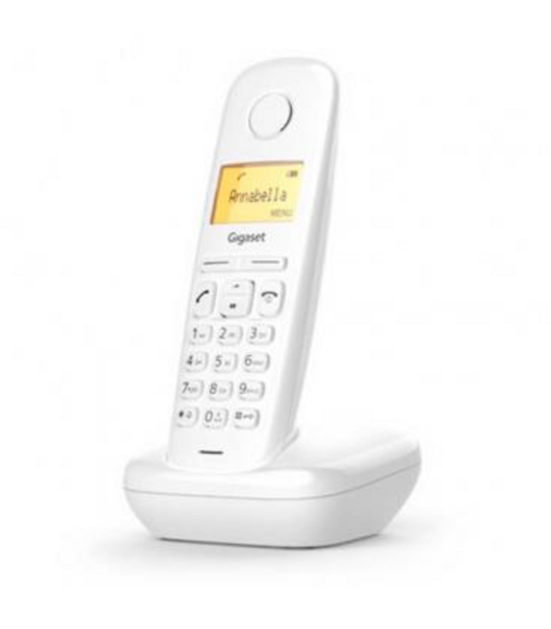Un telefono cordless bianco con tastiera e display giallo è su una base di ricarica.