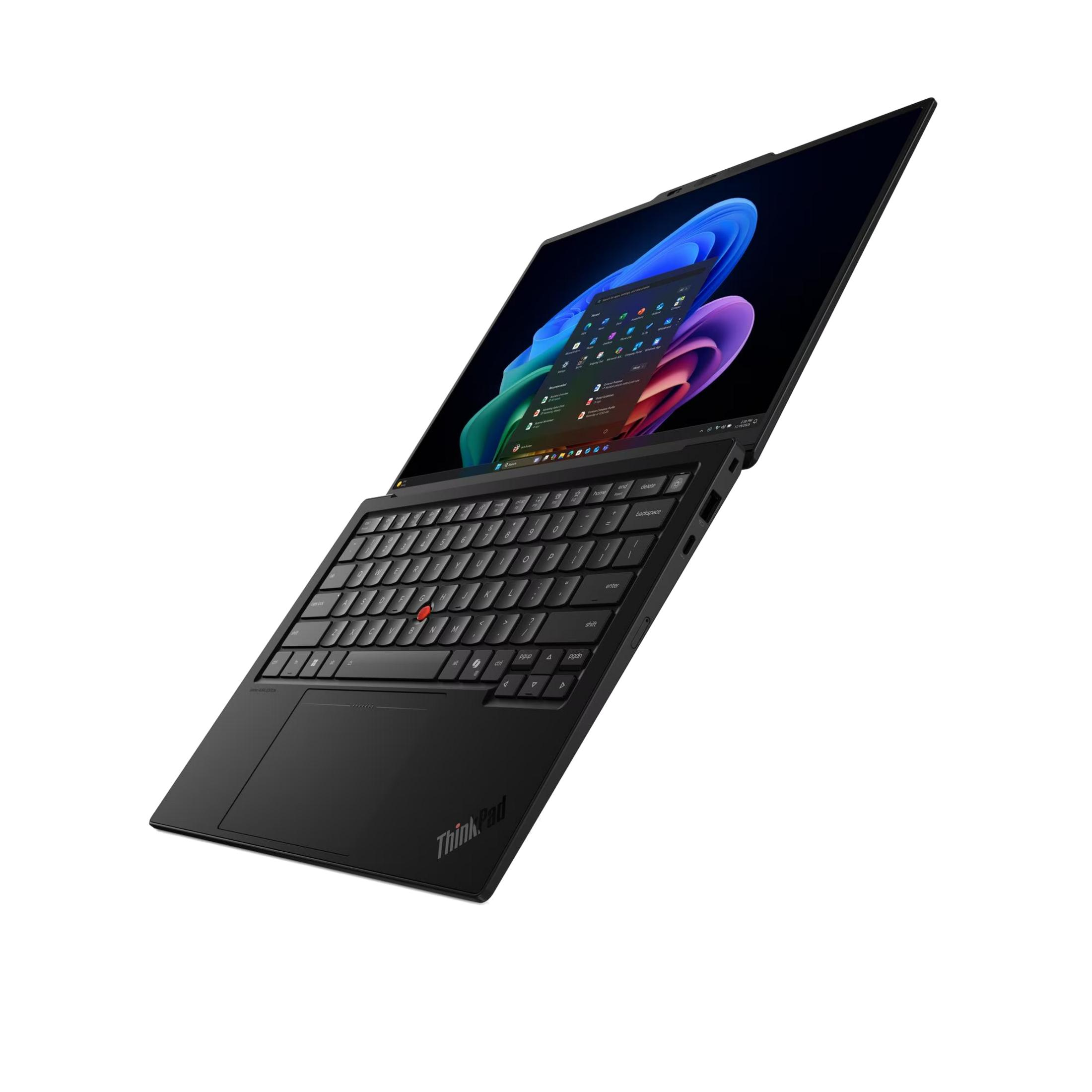 Un portátil negro con la pantalla abierta, mostrando una interfaz de escritorio colorida.