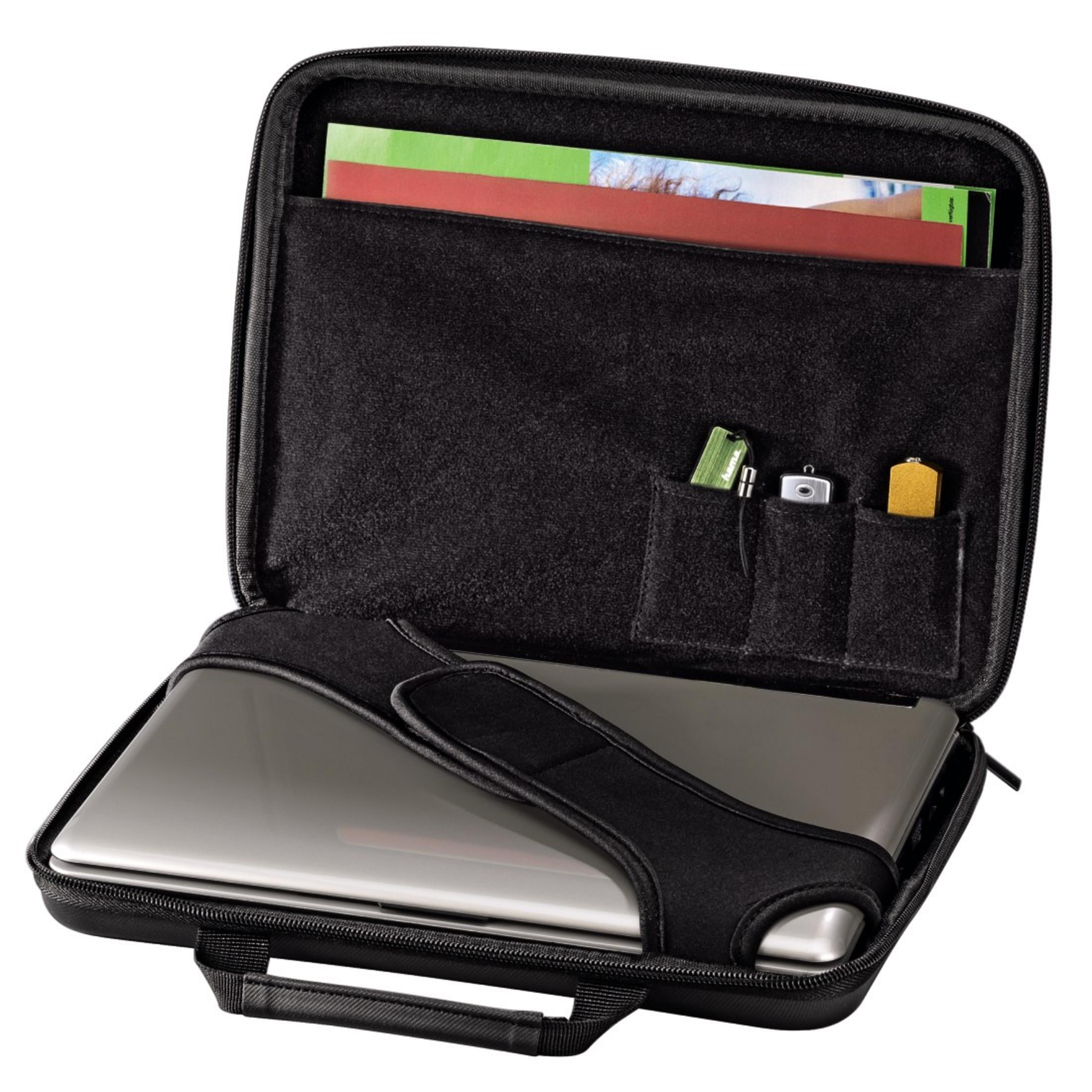 An open black laptop bag with a laptop, office supplies and storage media inside.