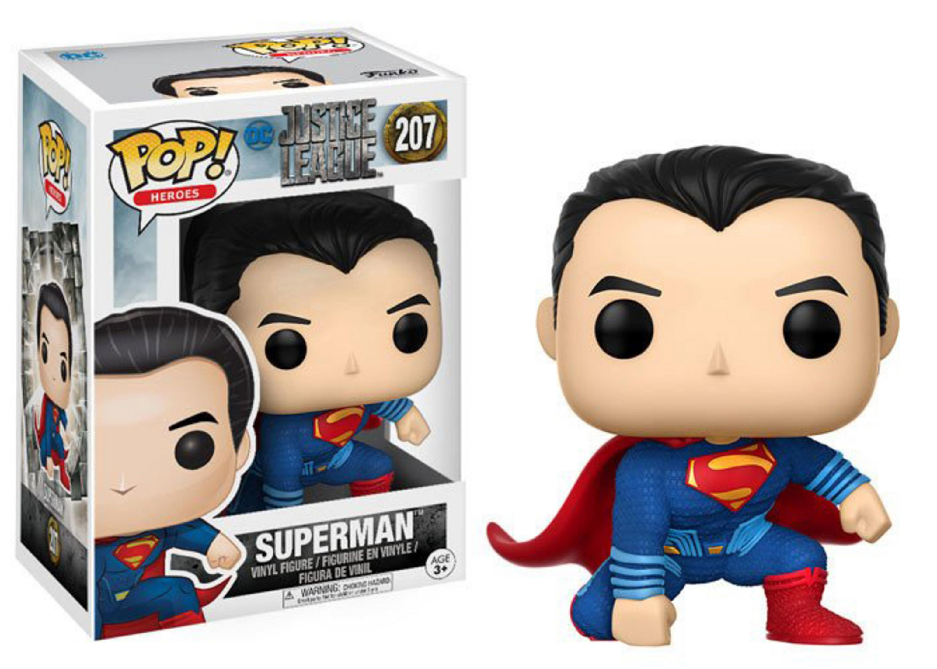 Action figure Funko Pop Superman in scatola, costume blu, mantello rosso, in ginocchio.