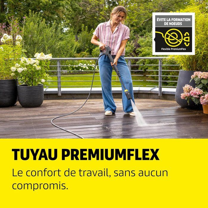 Donna pulisce terrazzo in legno con idropulitrice. Simbolo anti-nodo.